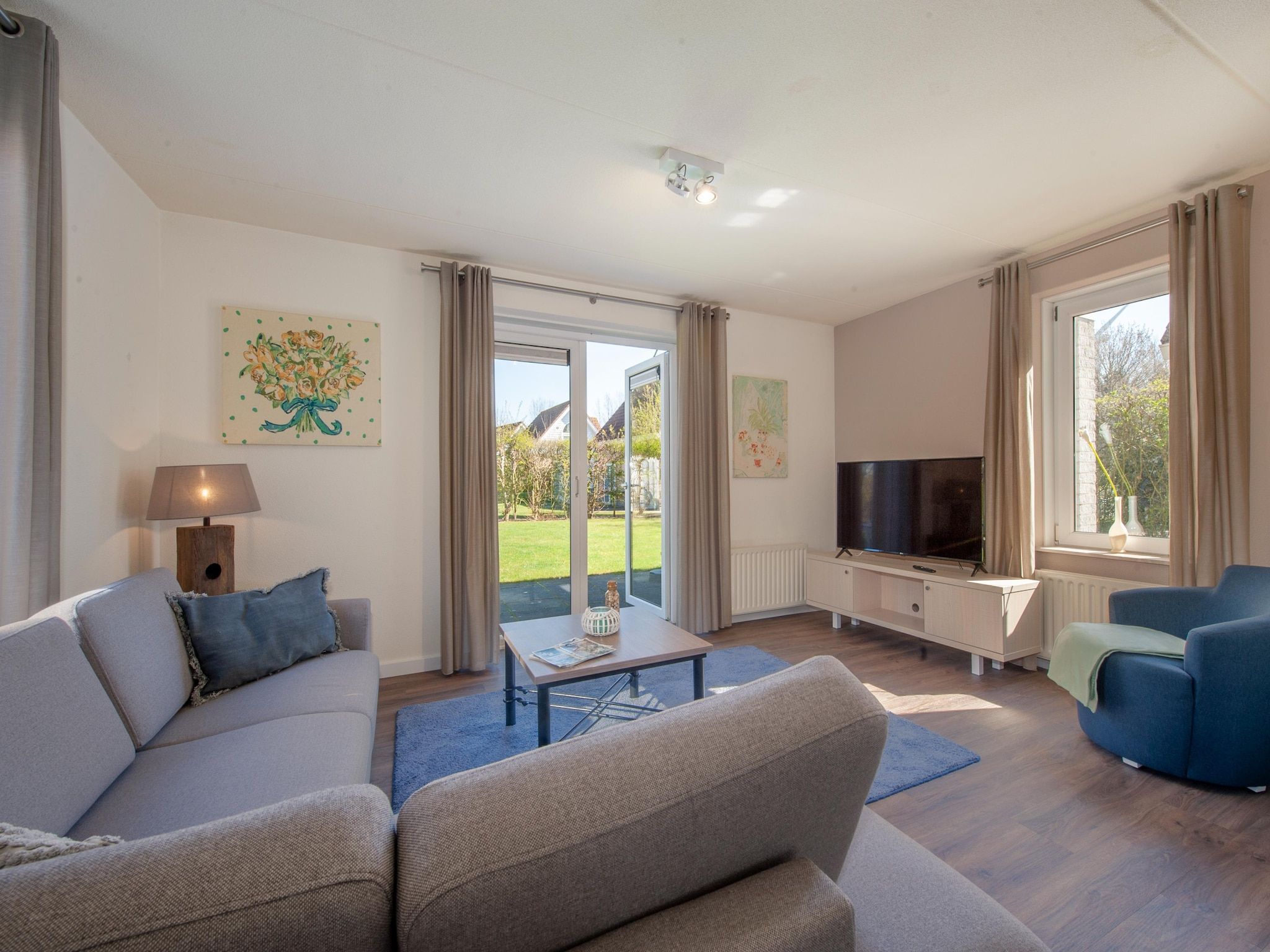 De woonkamer van Noordzee Résidence De Banjaard 12 in Kamperland