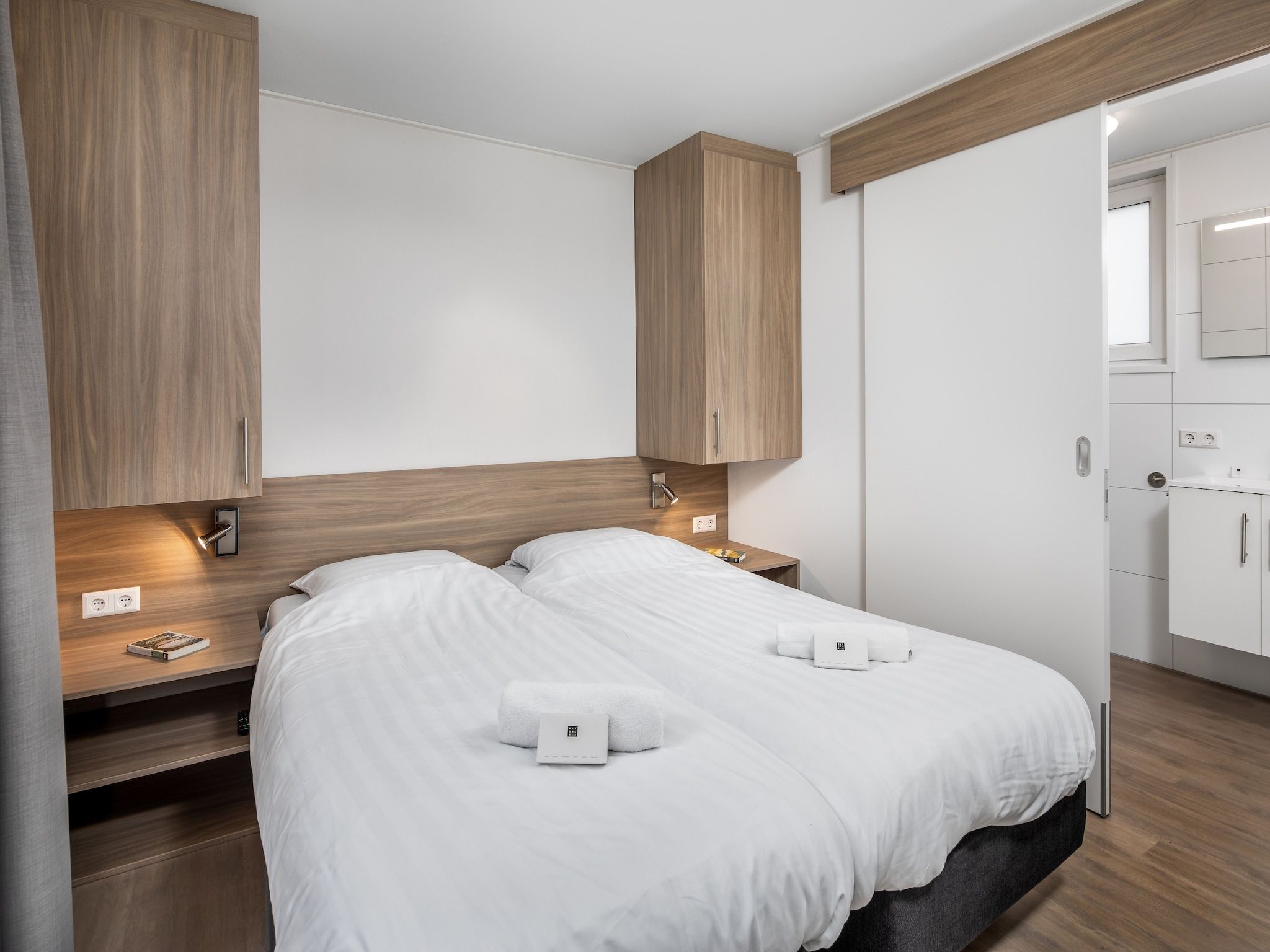 Een slaapkamer van Vakantiepark Zeebad 8 in Breskens