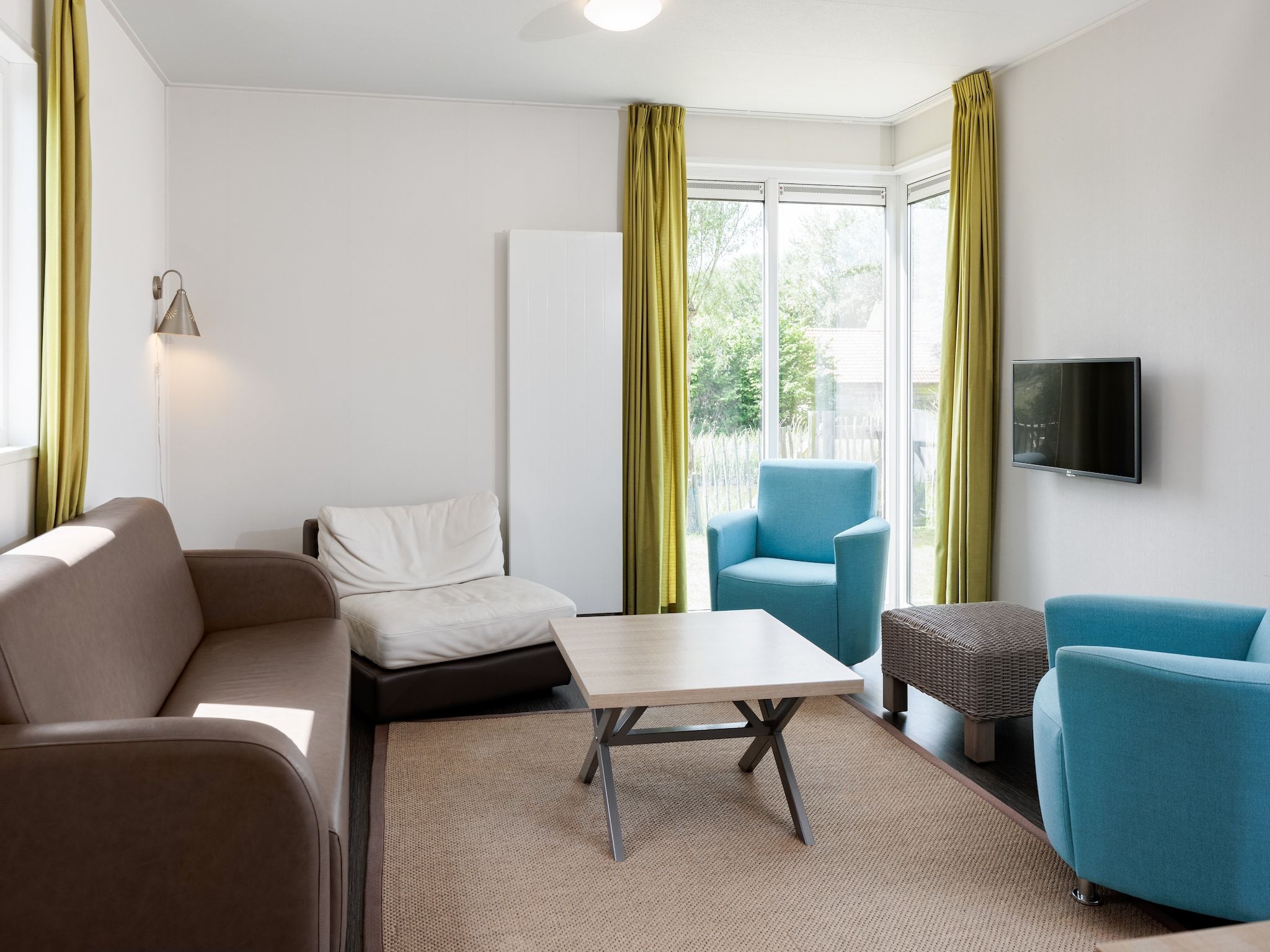 De woonkamer van Vakantiepark Zeebad 5 in Breskens