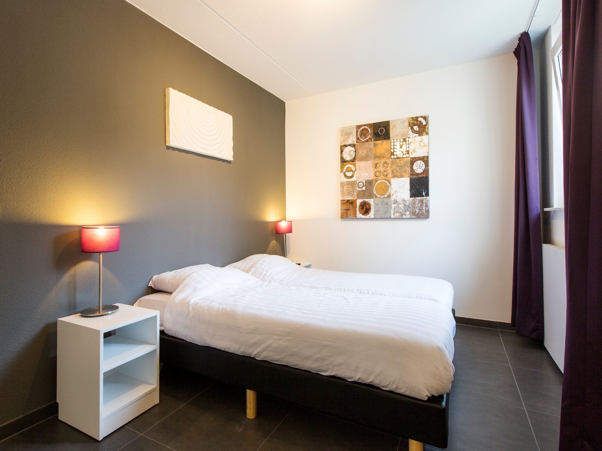 Een slaapkamer van Resort Arcen 17 in Arcen