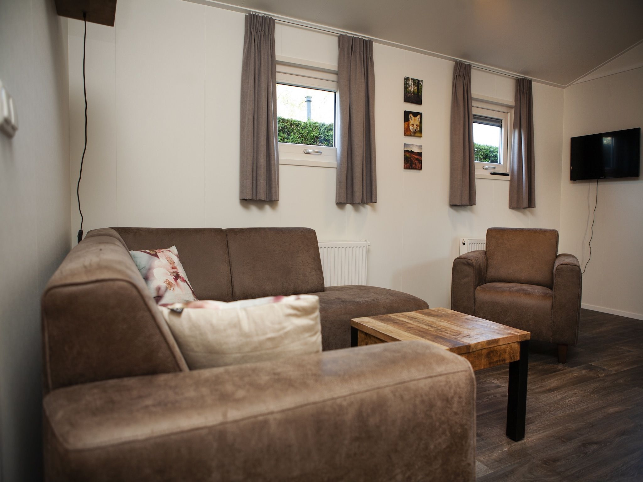 De woonkamer van Recreatiepark de Boshoek 22 in Voorthuizen