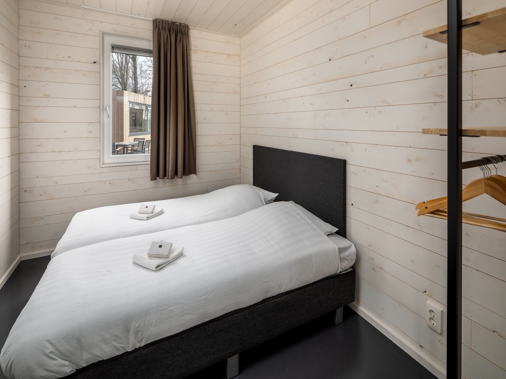 Een slaapkamer van Vakantiepark Schaijk 1 in Schaijk
