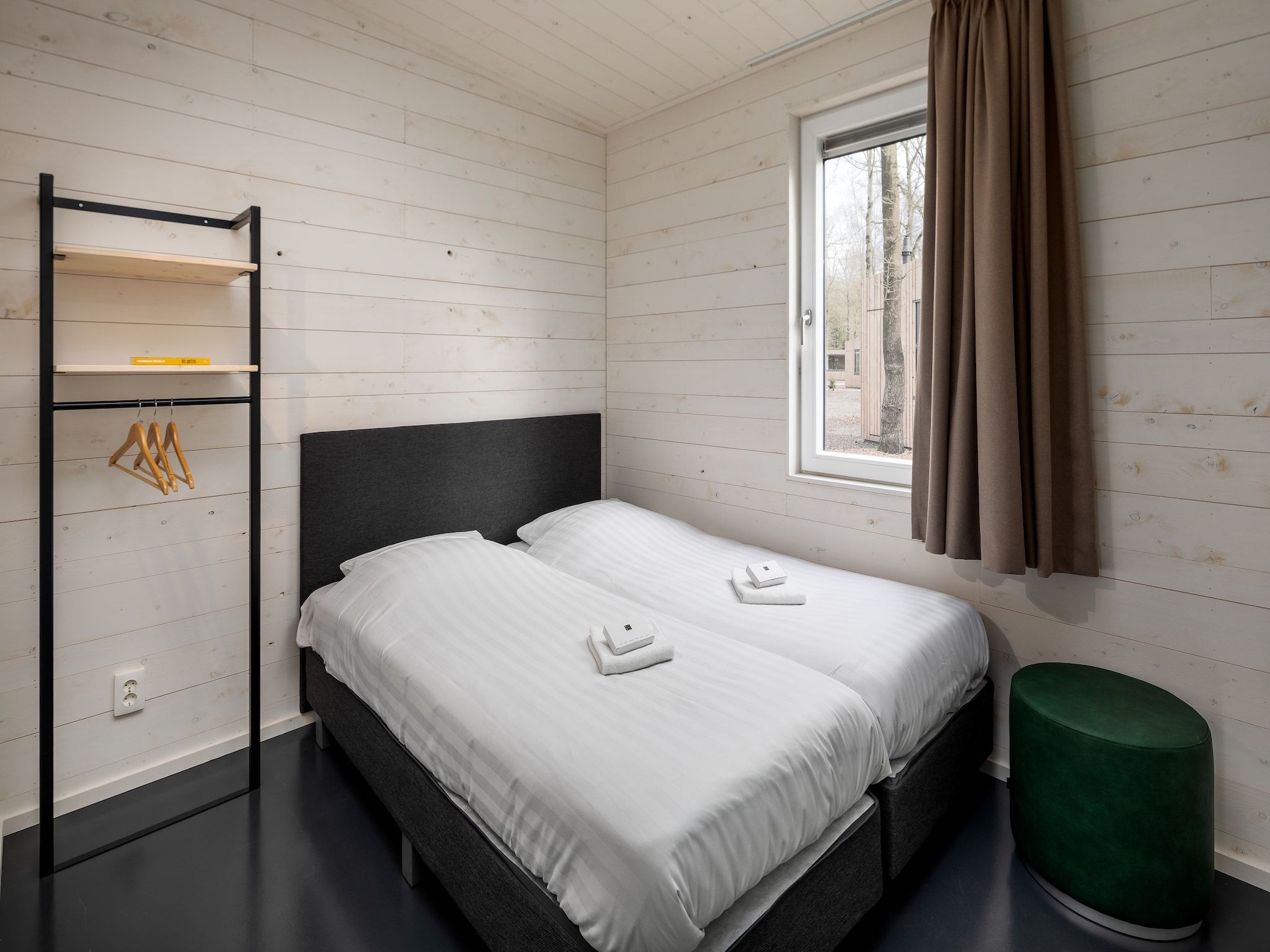 Een slaapkamer van Vakantiepark Schaijk 1 in Schaijk