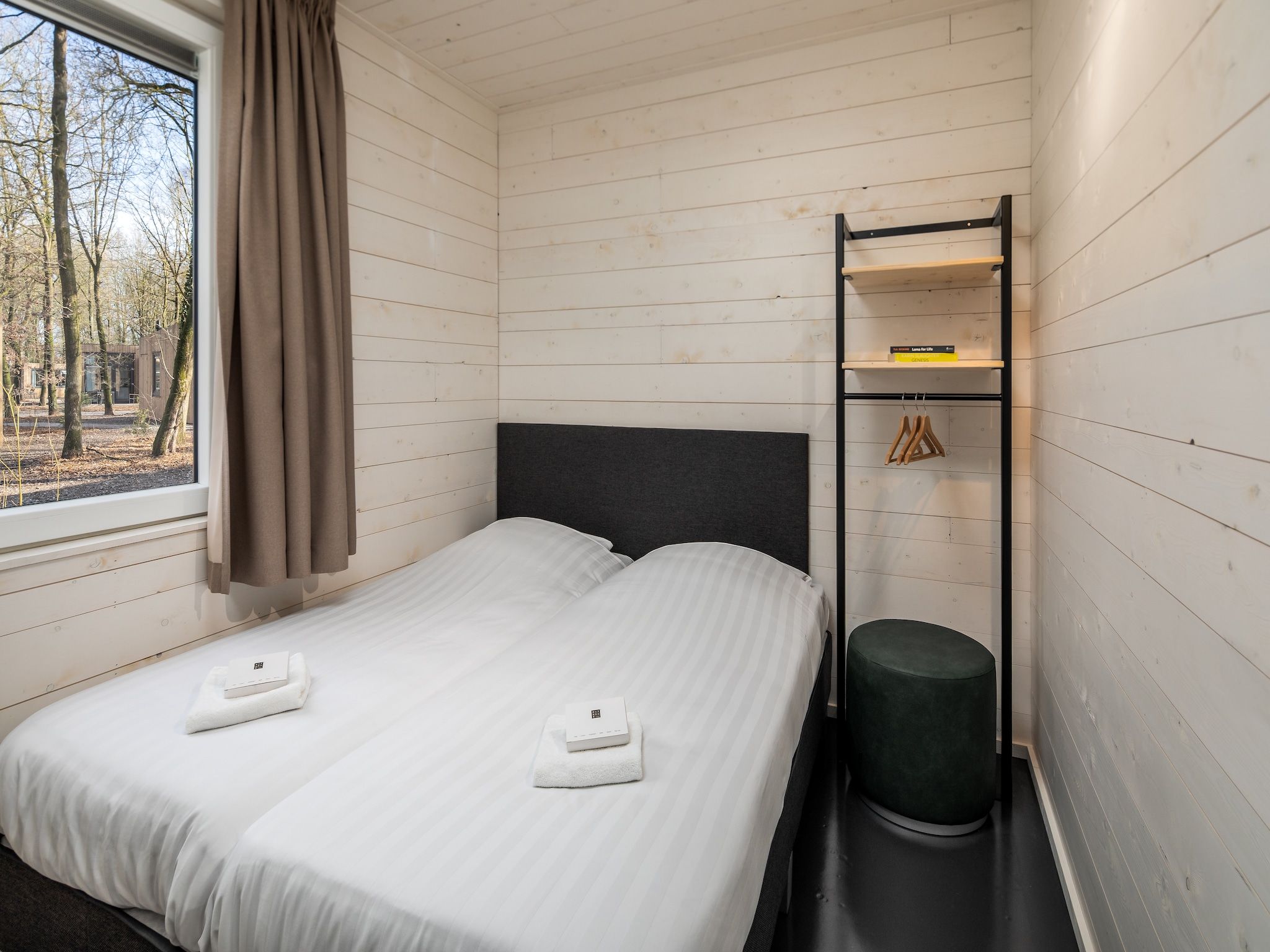 Een slaapkamer van Vakantiepark Schaijk 2 in Schaijk