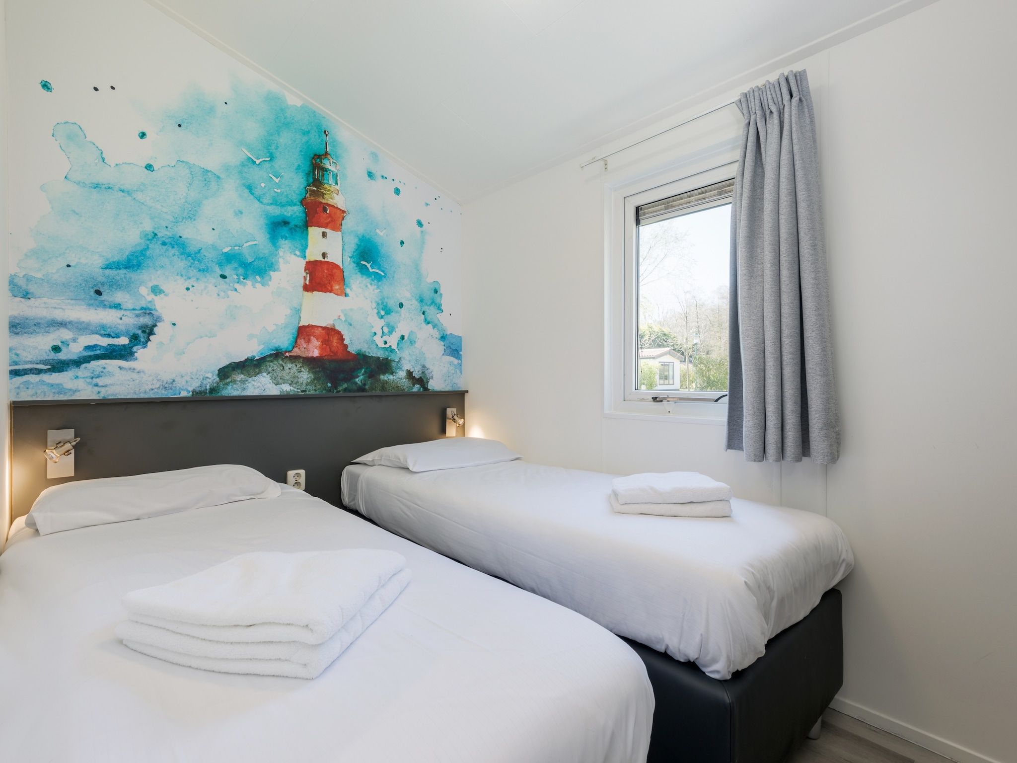 Een slaapkamer van Kustpark Texel 5 in De Koog