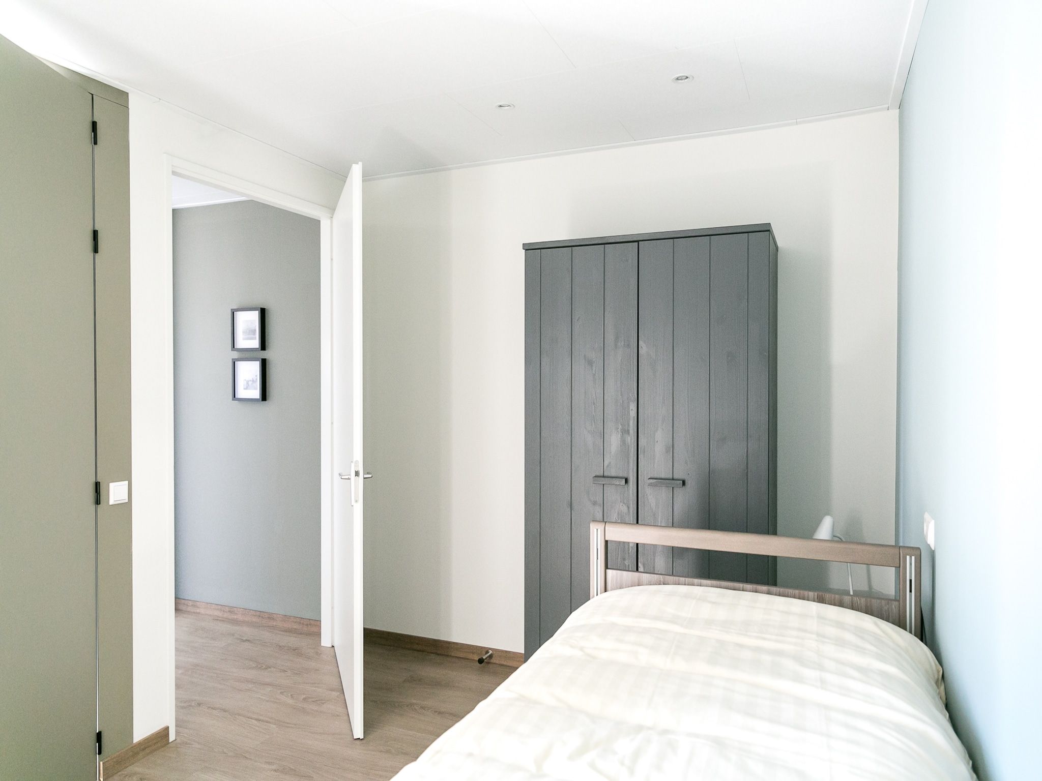 Een slaapkamer van Strandpark Vlugtenburg 7 in 's-Gravenzande