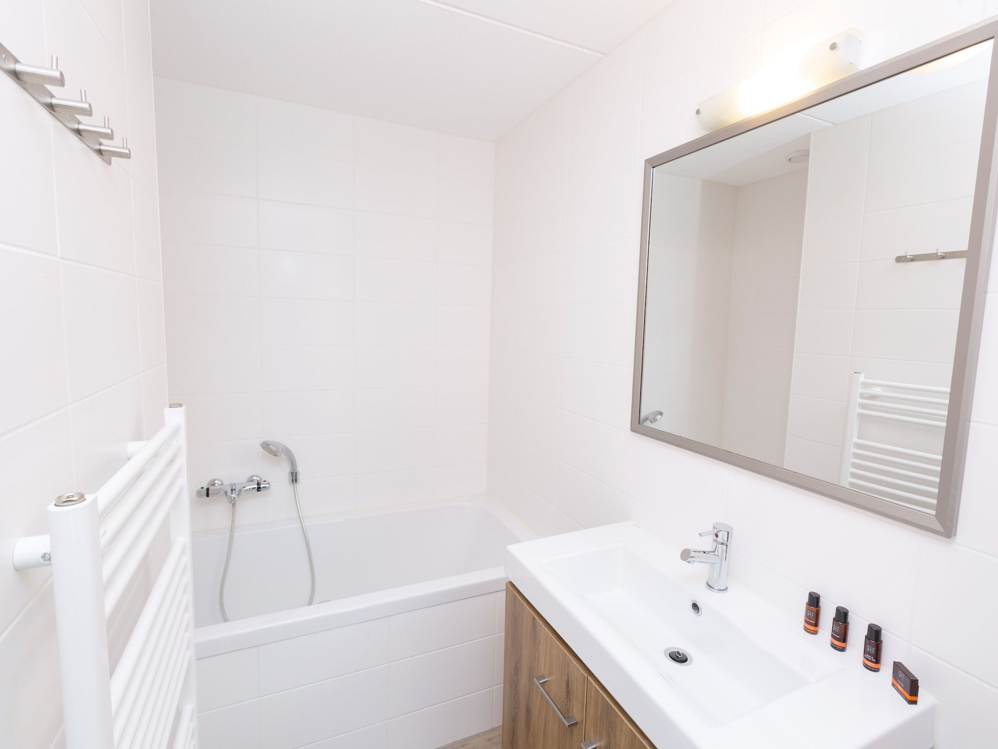 De badkamer van Strandpark Duynhille 1 in Ouddorp