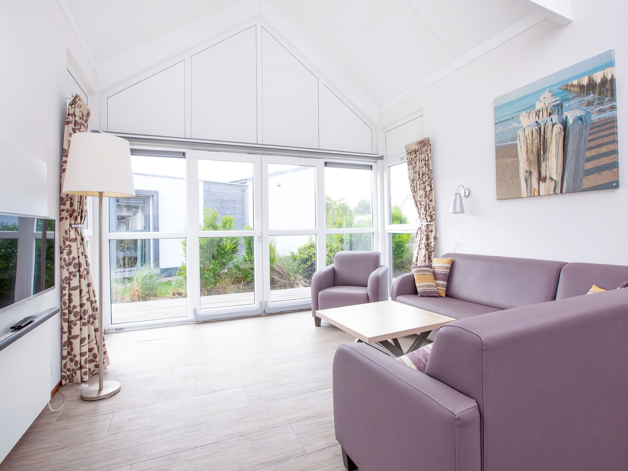 De woonkamer van Strandpark Duynhille 2 in Ouddorp