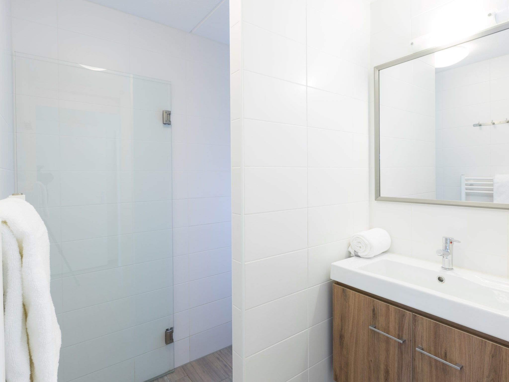 De badkamer van Strandpark Duynhille 3 in Ouddorp