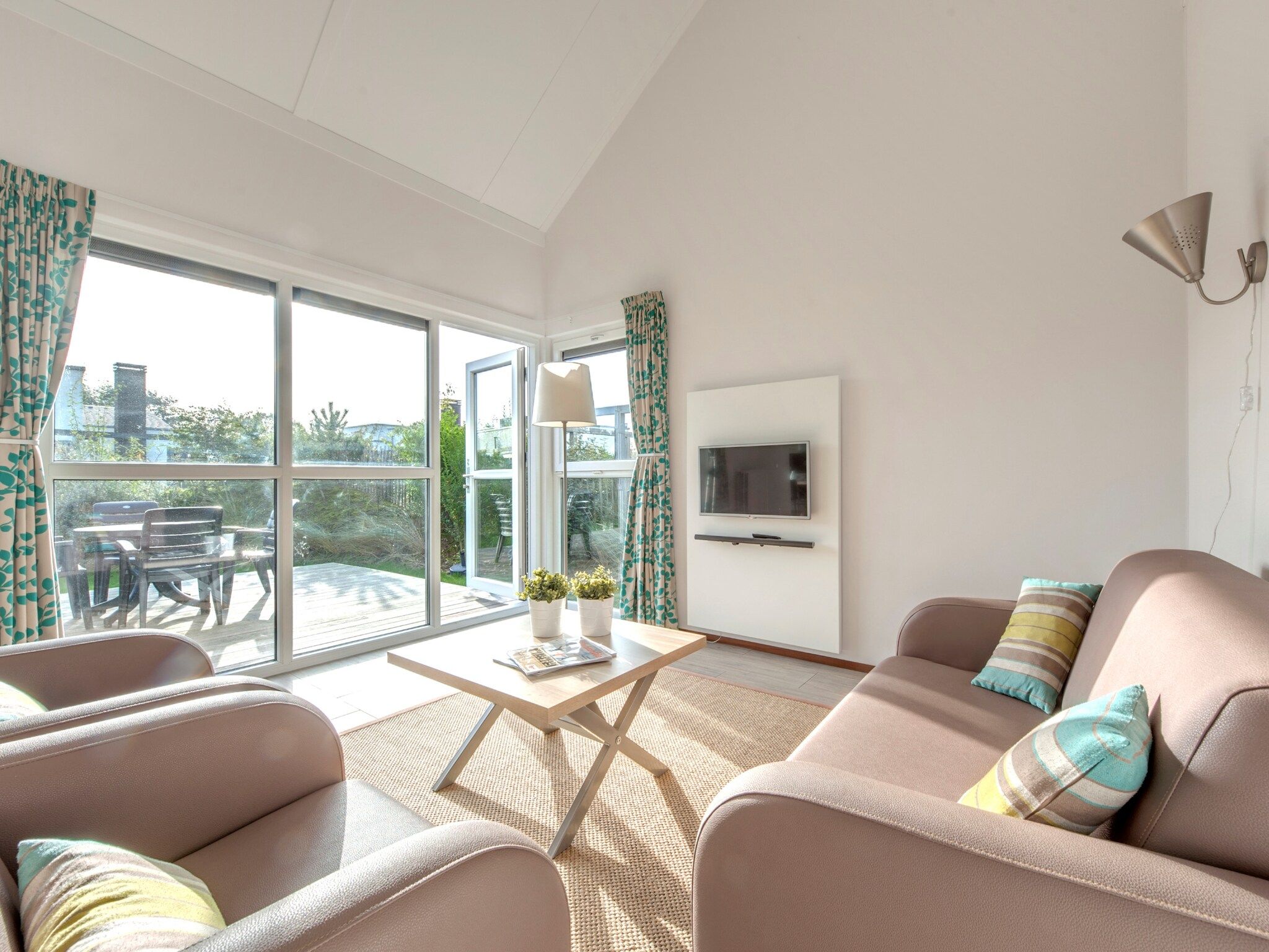 De woonkamer van Strandpark Duynhille 5 in Ouddorp