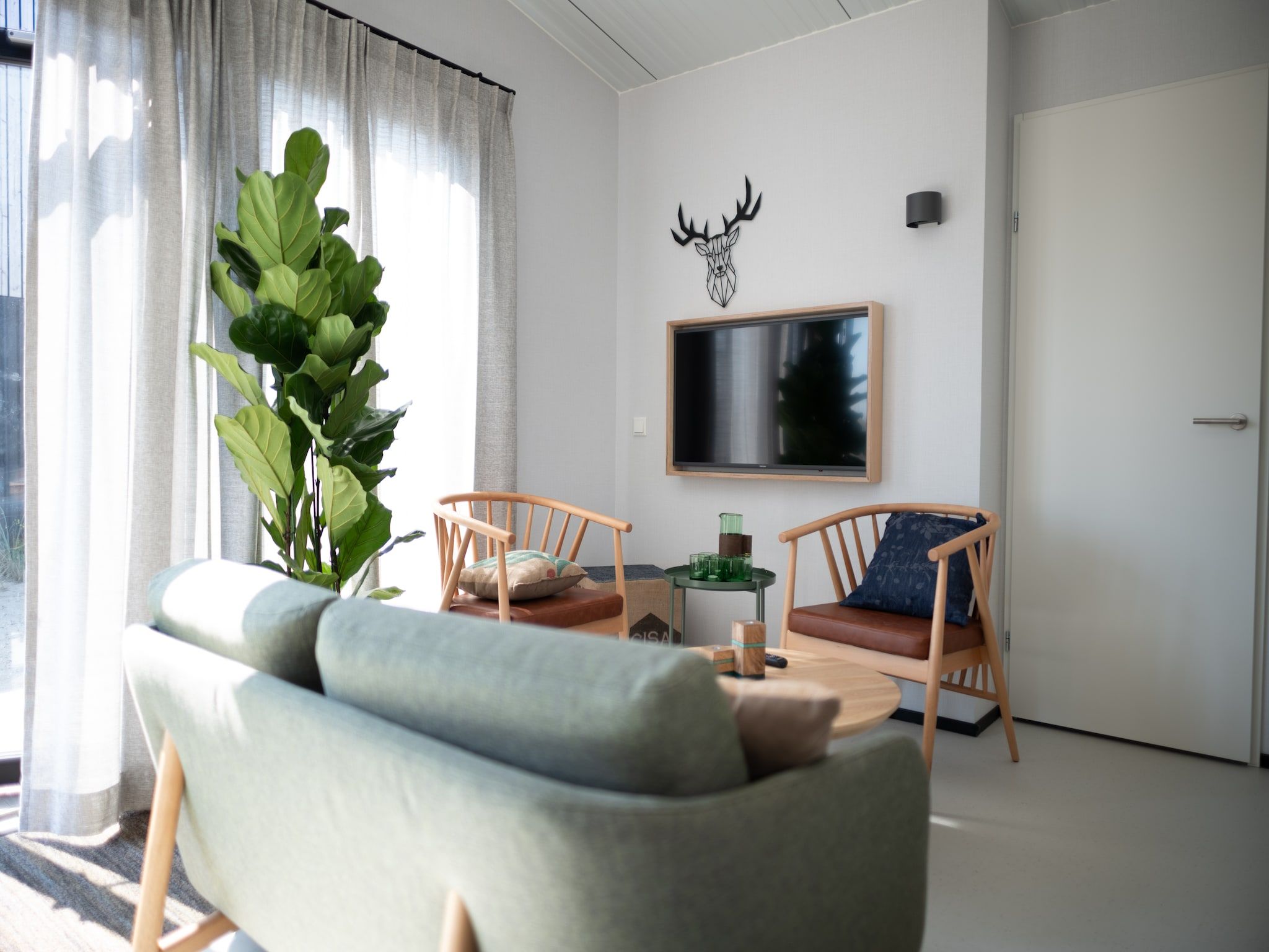 De woonkamer van Sea Lodges Zandvoort 9 in Zandvoort