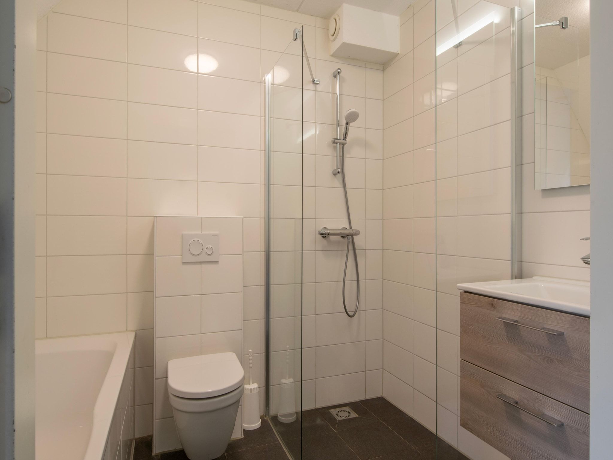 De badkamer van Vakantiepark de Soeten Haert 18 in Renesse