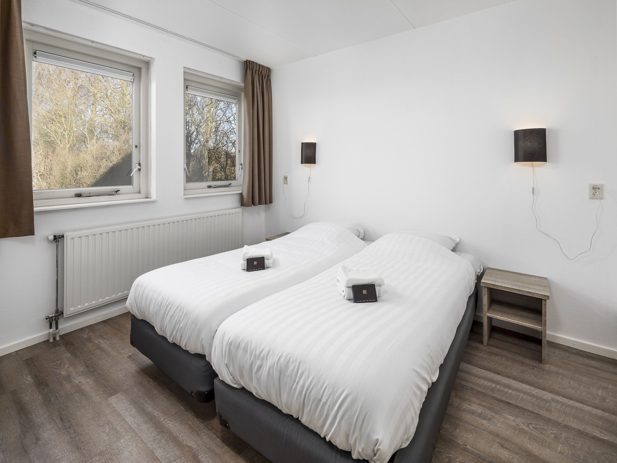 Een slaapkamer van Vakantiepark de Soeten Haert 18 in Renesse