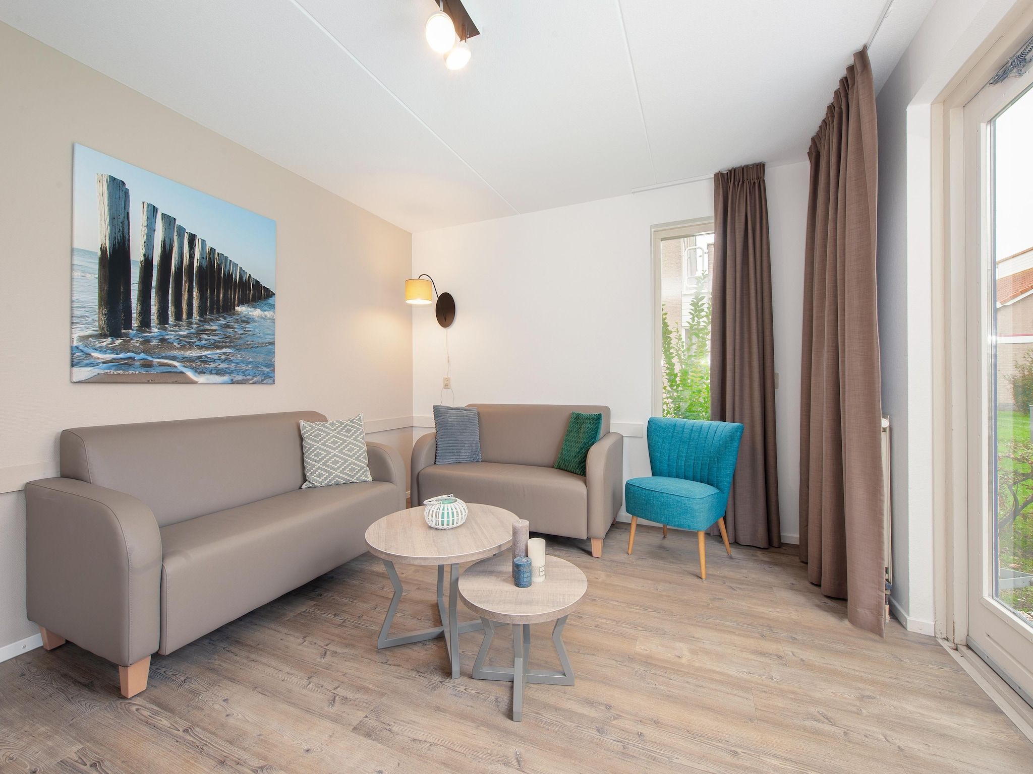 De woonkamer van Vakantiepark de Soeten Haert 19 in Renesse