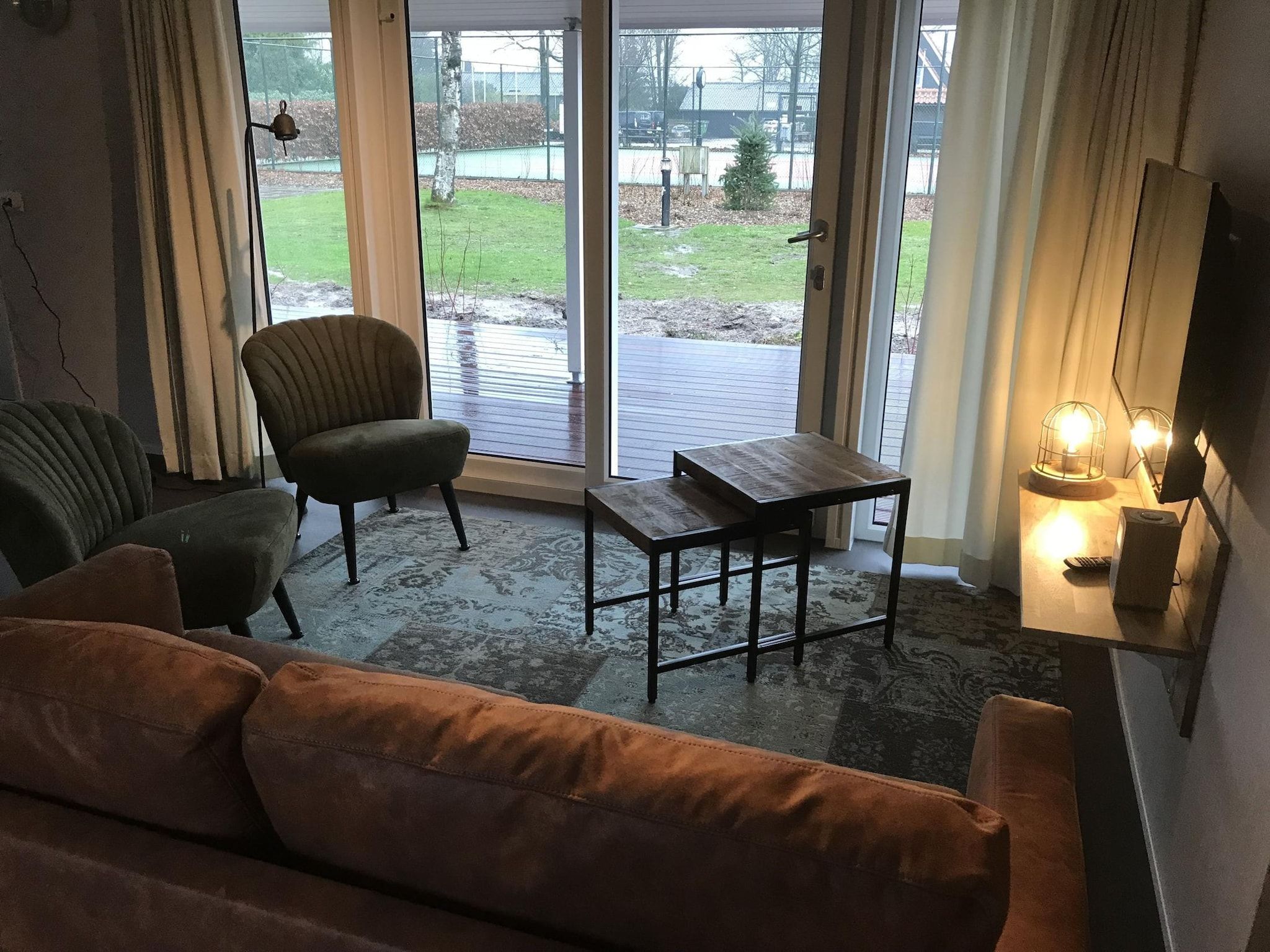 De woonkamer van Vakantiepark de Tabaksschuur 3 in Elst