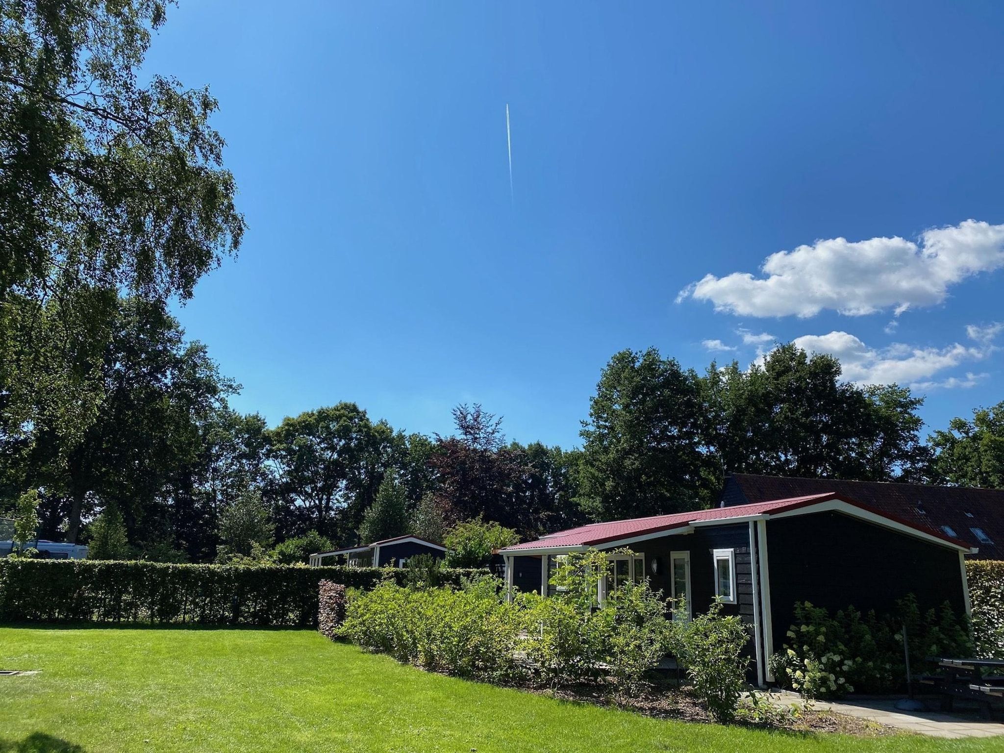 De buitenkant van Vakantiepark de Tabaksschuur 3 in Elst