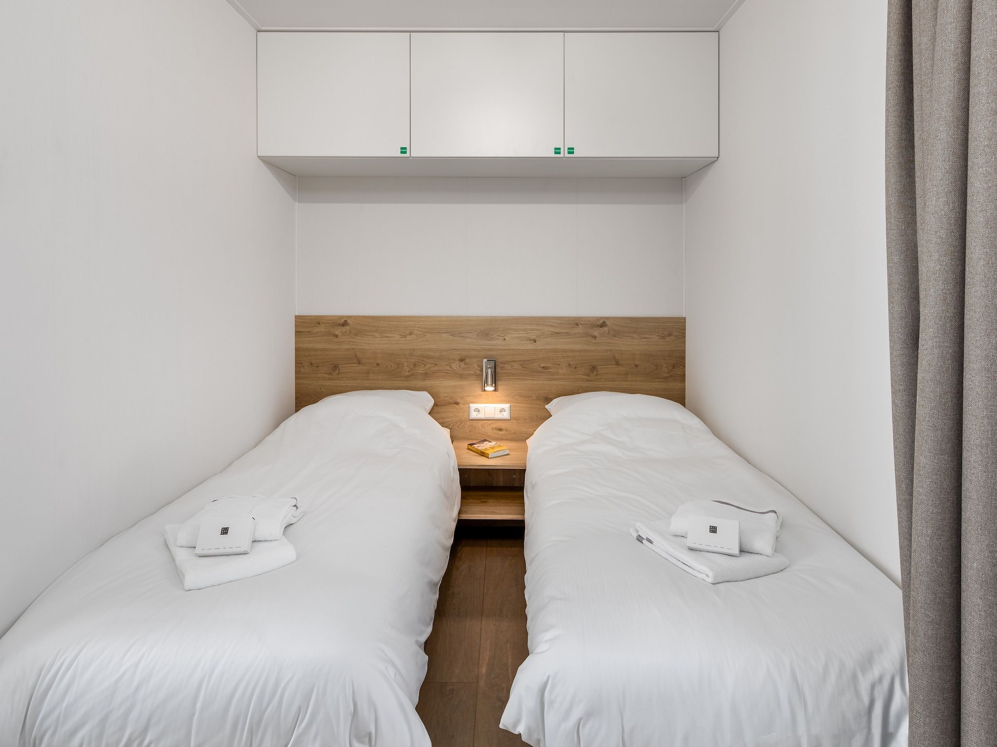 Een slaapkamer van Water Village 1 in Kamperland