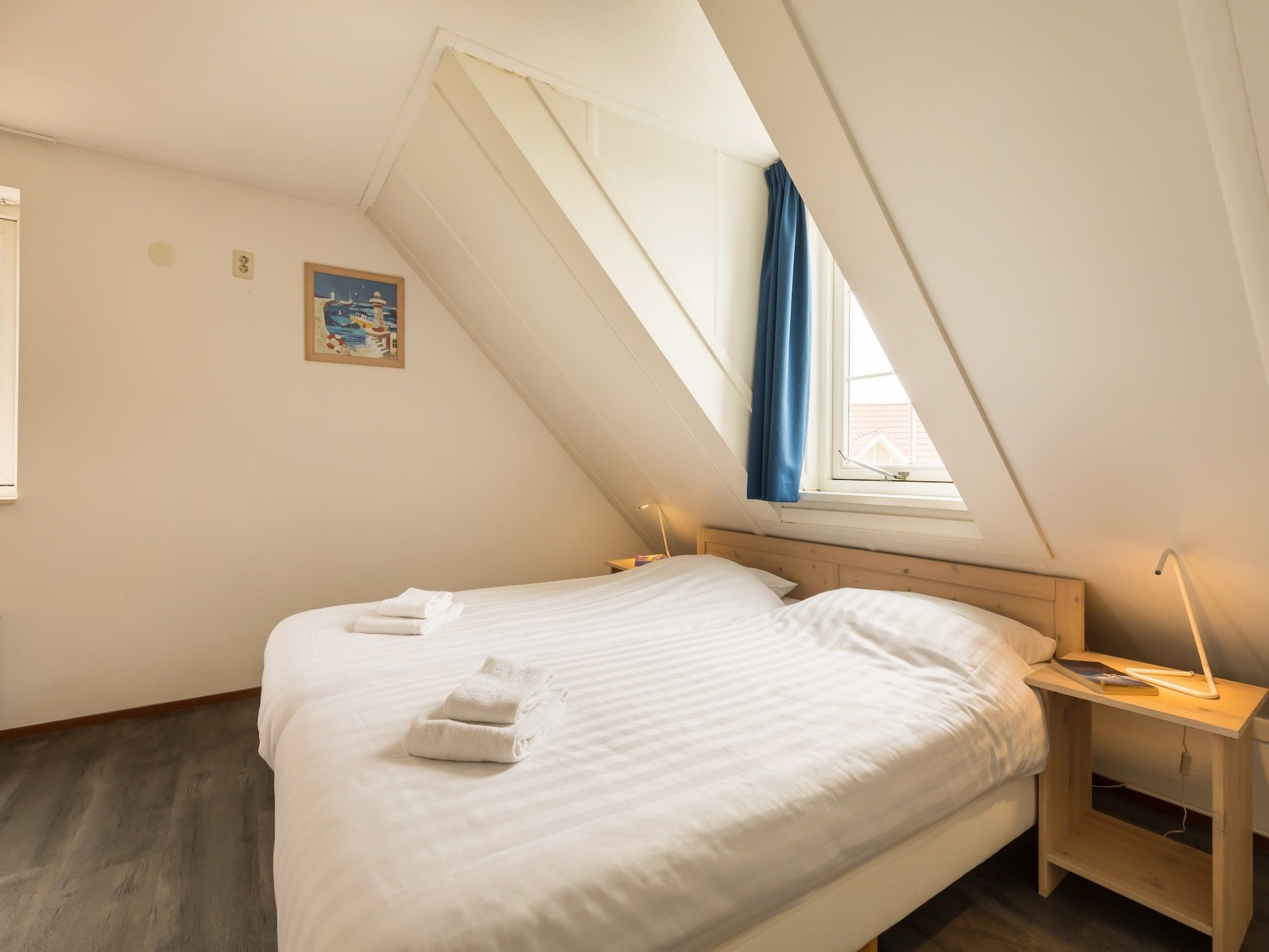 Een slaapkamer van Vakantiepark De Heeren van 's Gravensande 2 in 's-Gravenzande