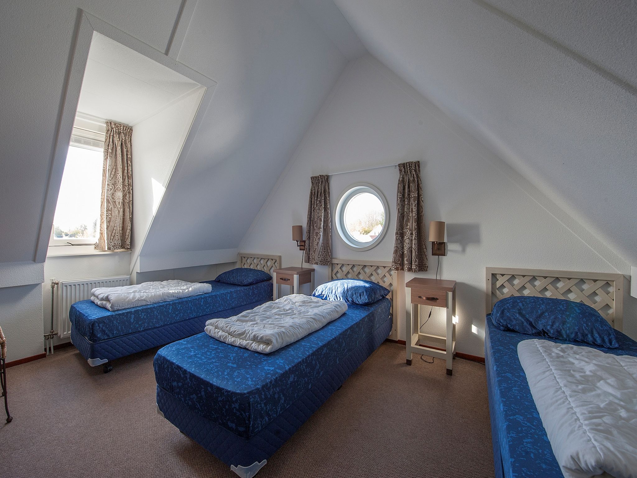 Een slaapkamer van Aquadelta 38 in Bruinisse