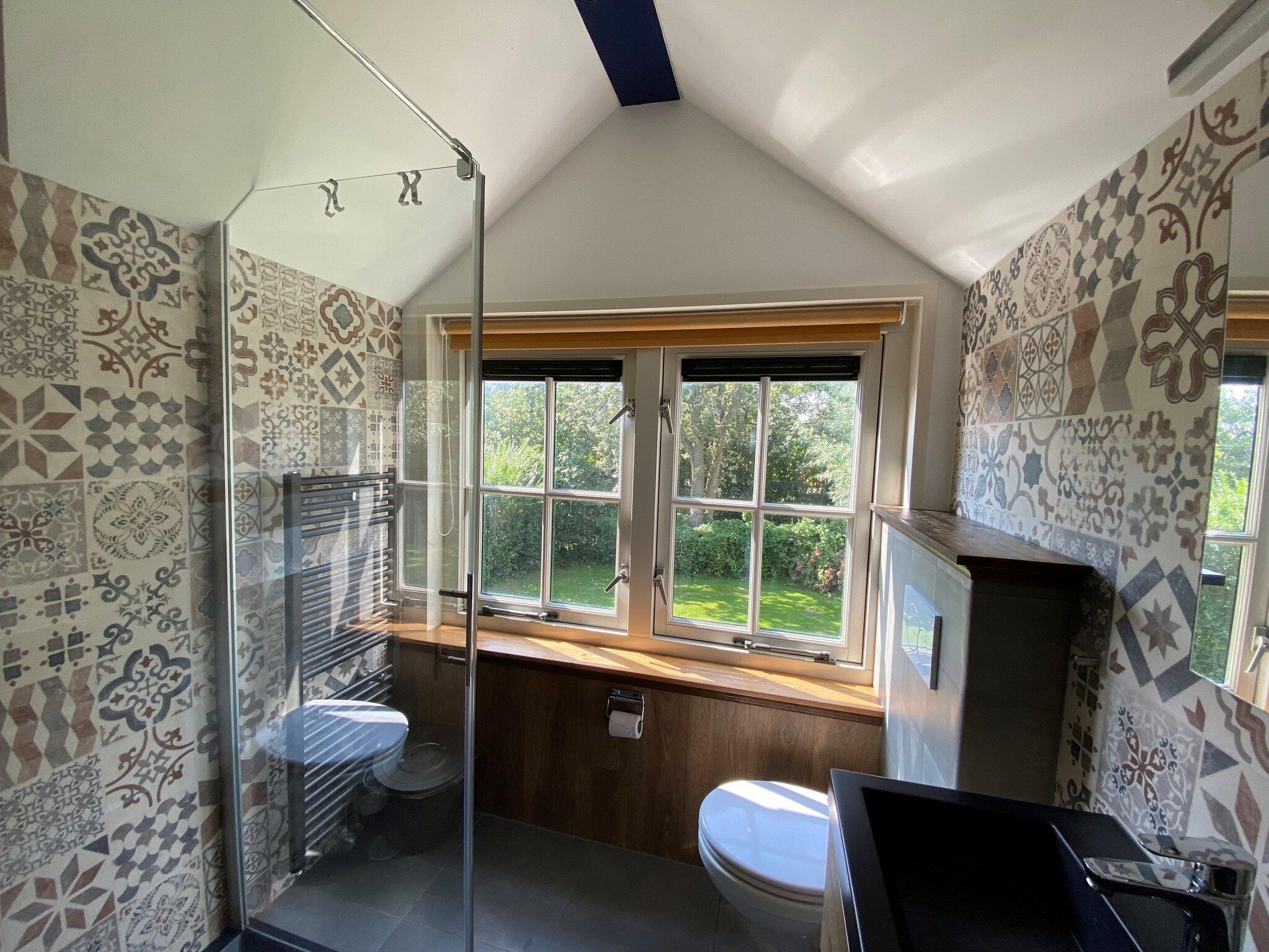 De badkamer van Recreatiepark Wiringherlant - Villa 18 in Hippolytushoef