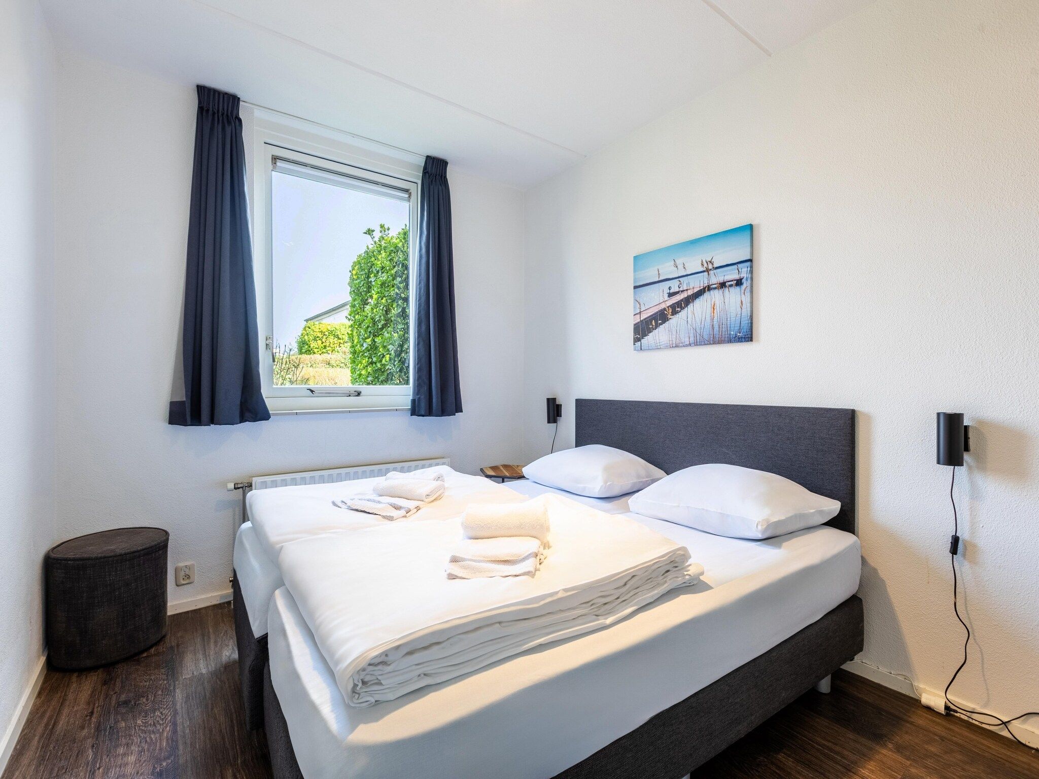 Een slaapkamer van Roompot Beach Resort 21 in Kamperland