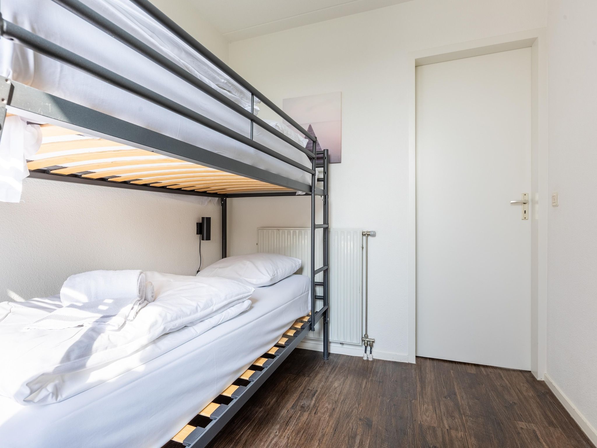 Een slaapkamer van Roompot Beach Resort 21 in Kamperland