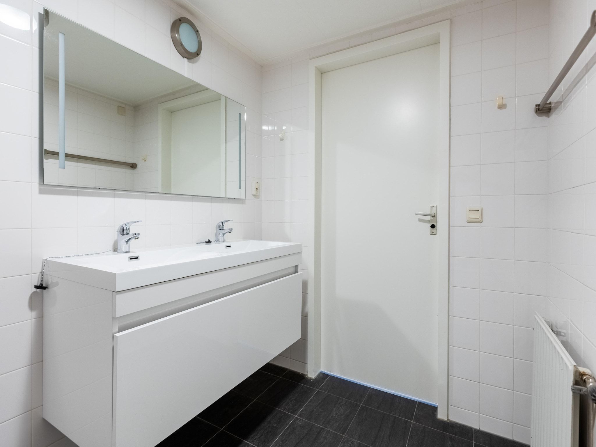 De badkamer van Roompot Beach Resort 21 in Kamperland