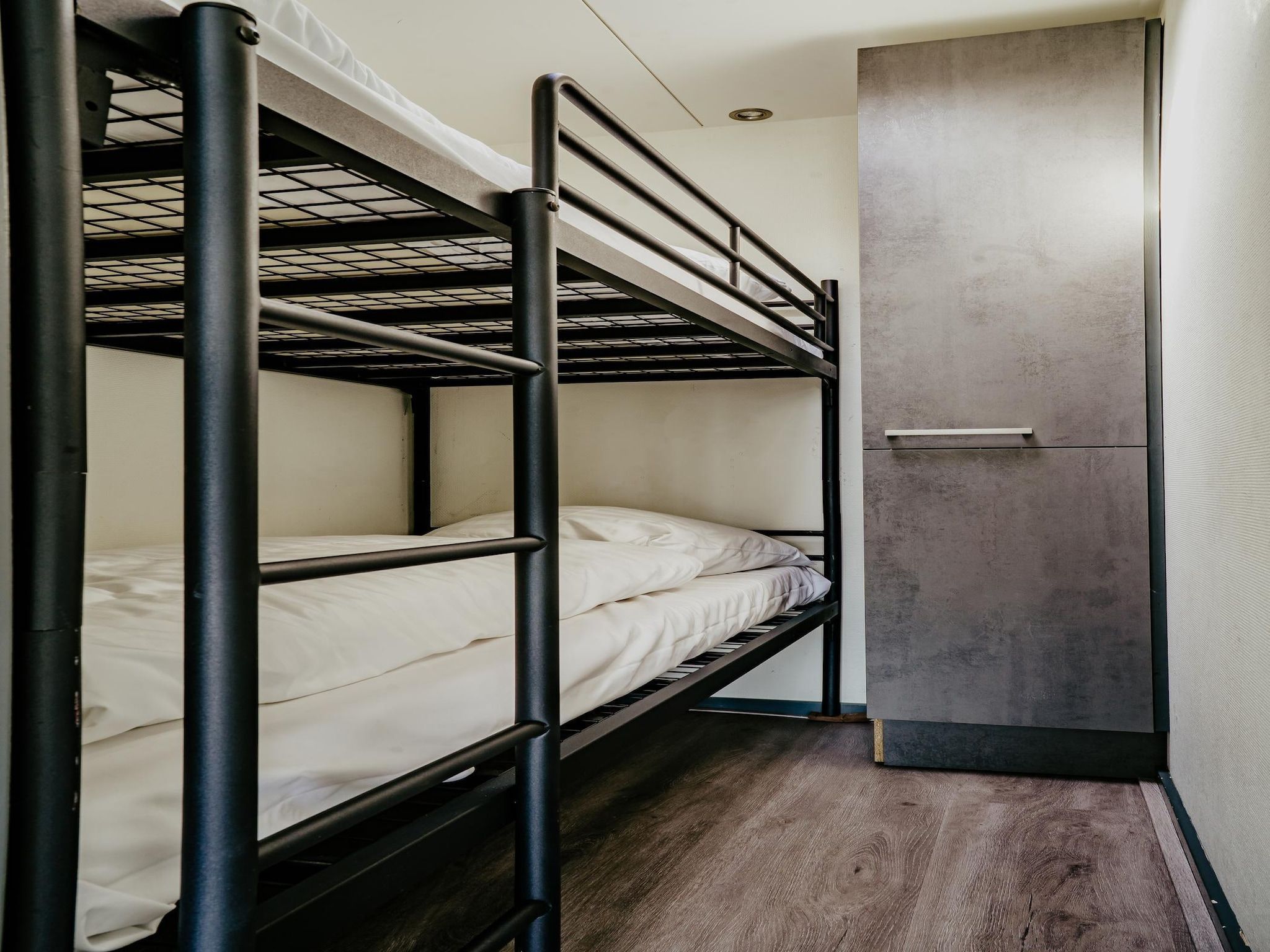 Een slaapkamer van Waterpark de Meerparel 9 in Uitgeest