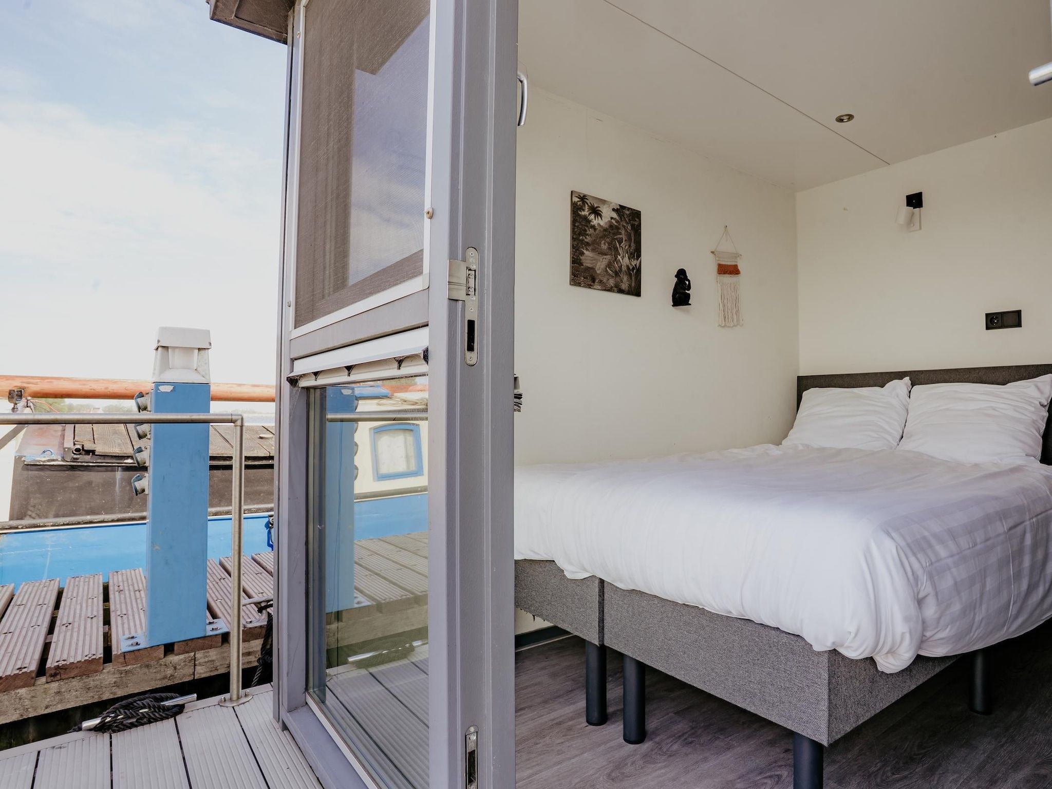 Een slaapkamer van Waterpark de Meerparel 9 in Uitgeest