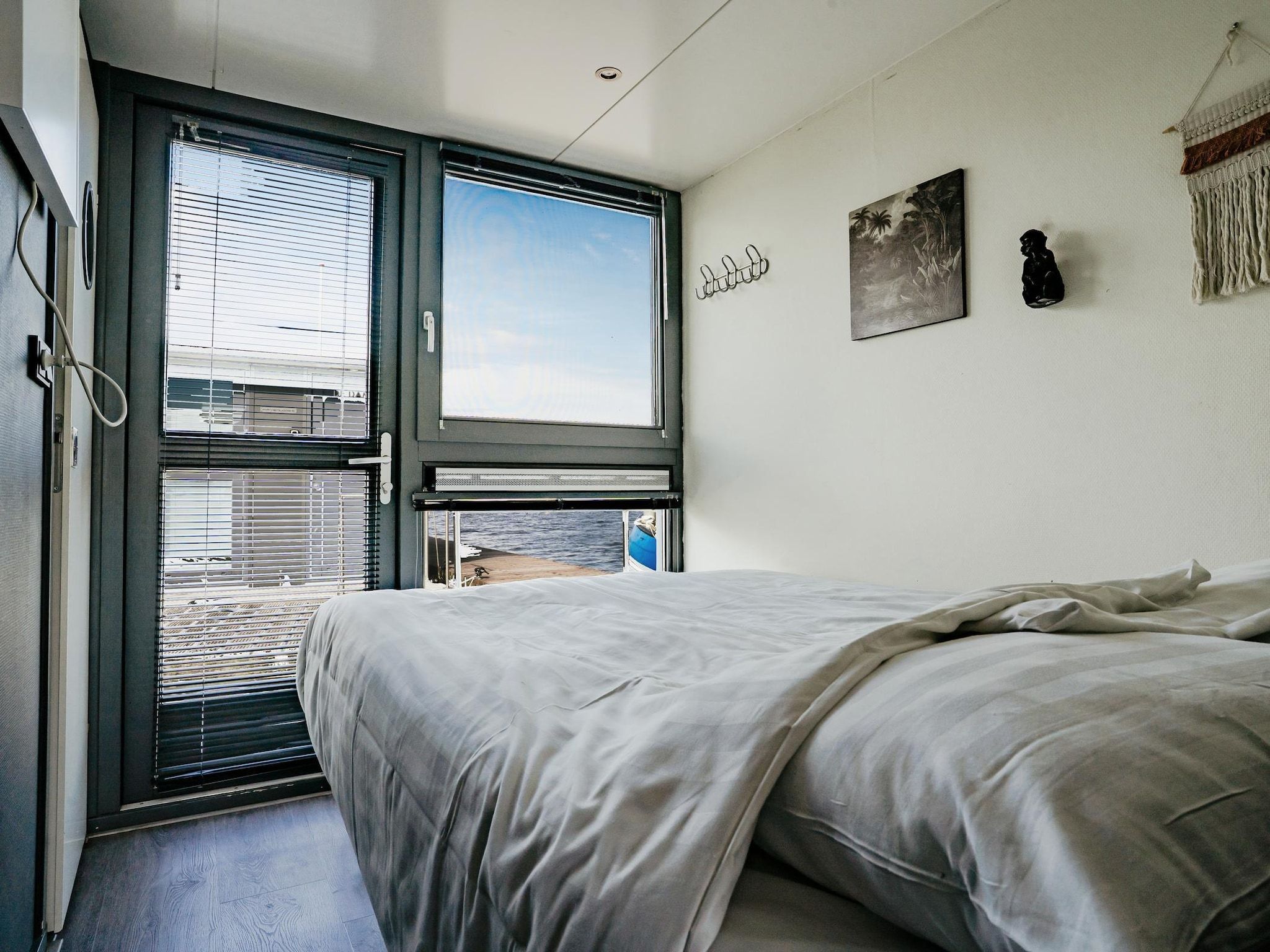 Een slaapkamer van Waterpark de Meerparel 9 in Uitgeest