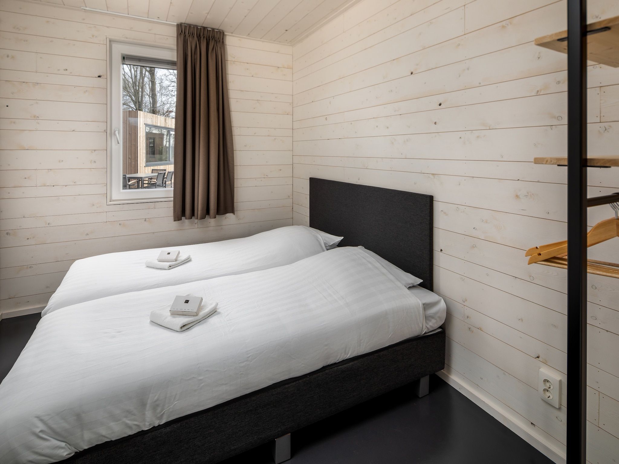 Een slaapkamer van Vakantiepark Schaijk 3 in Schaijk