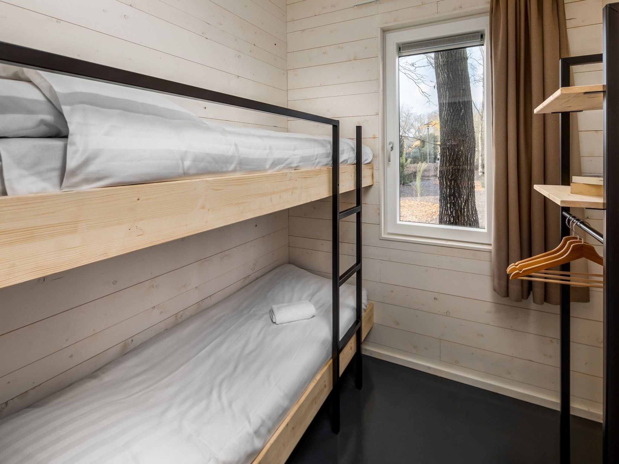 Een slaapkamer van Vakantiepark Schaijk 4 in Schaijk