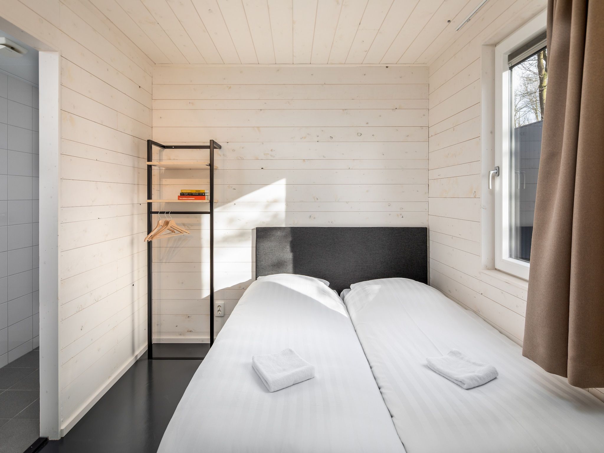 Een slaapkamer van Vakantiepark Schaijk 4 in Schaijk