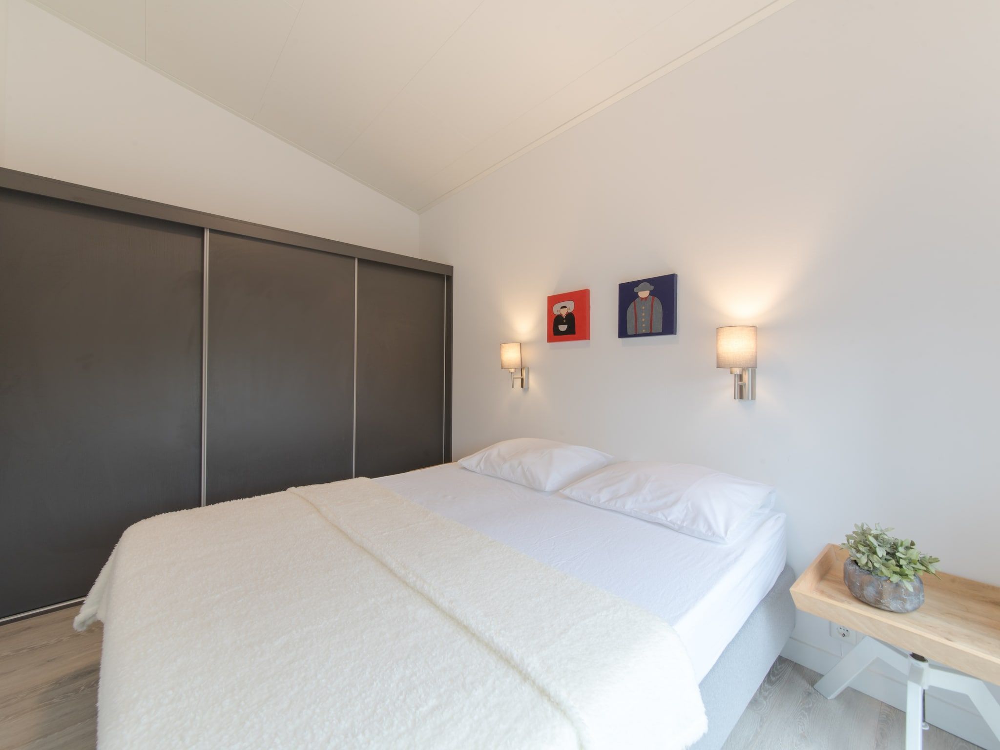 Een slaapkamer van Water Resort Oosterschelde 46 in Wemeldinge