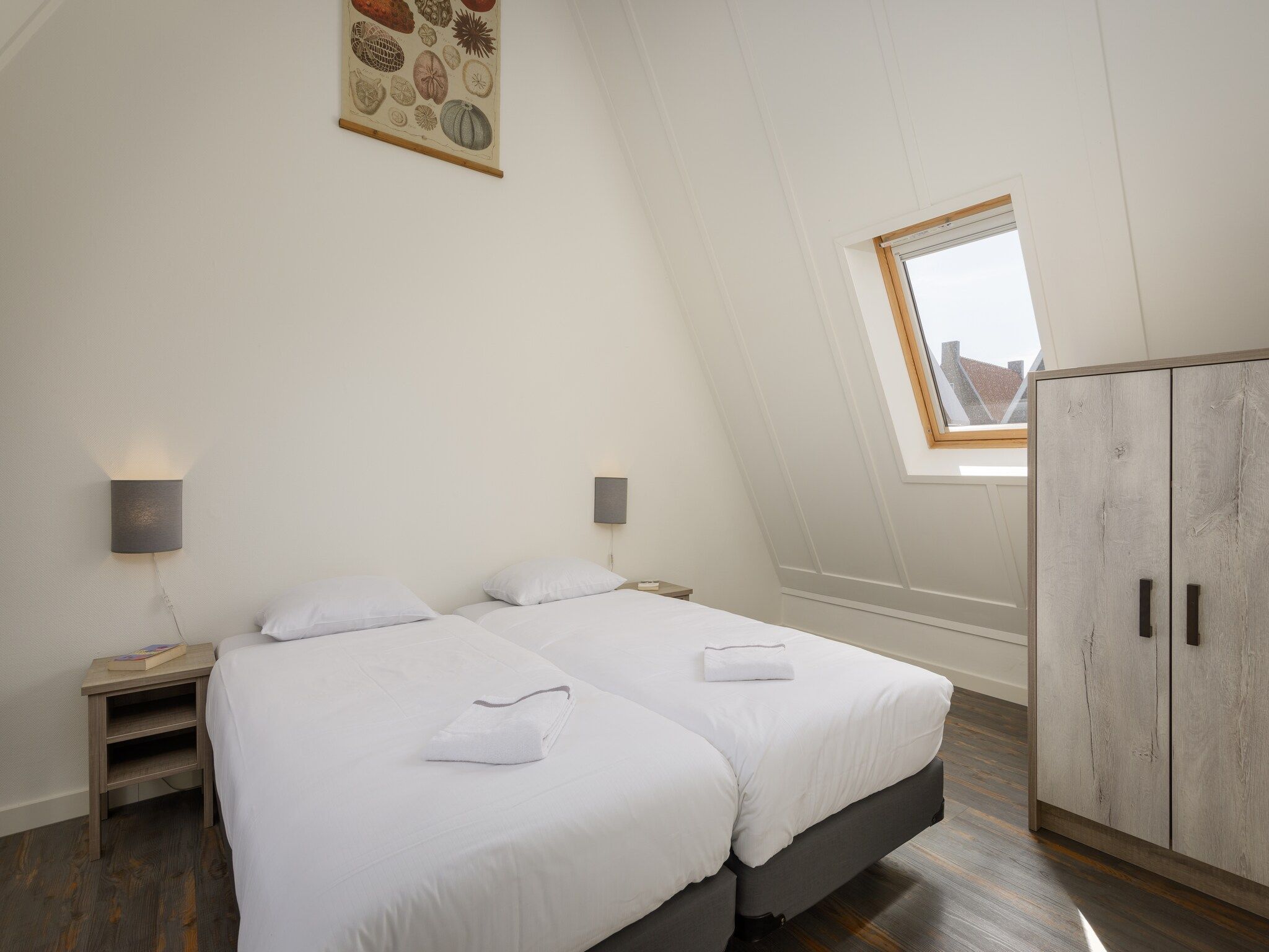 Een slaapkamer van Marinapark Volendam 9 in Volendam
