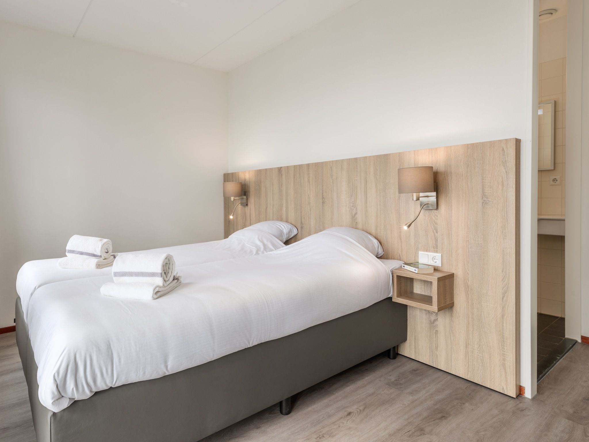 Een slaapkamer van Marinapark Volendam 11 in Volendam