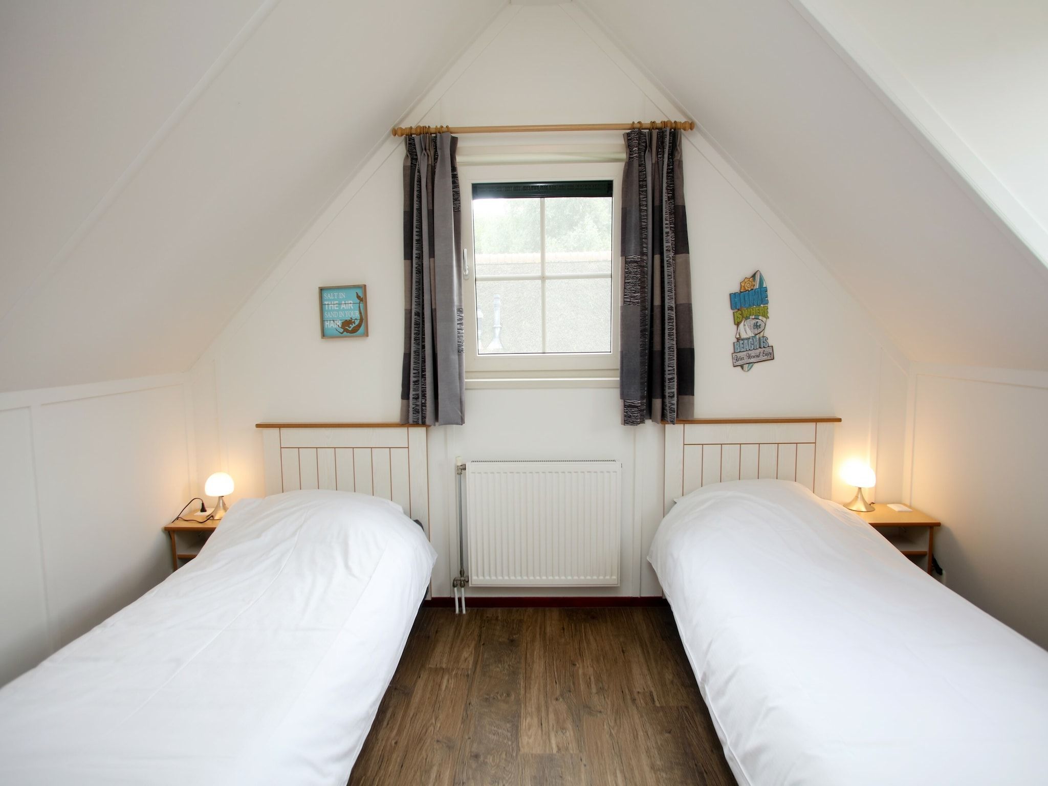 Een slaapkamer van Kustpark Texel 11 in De Koog