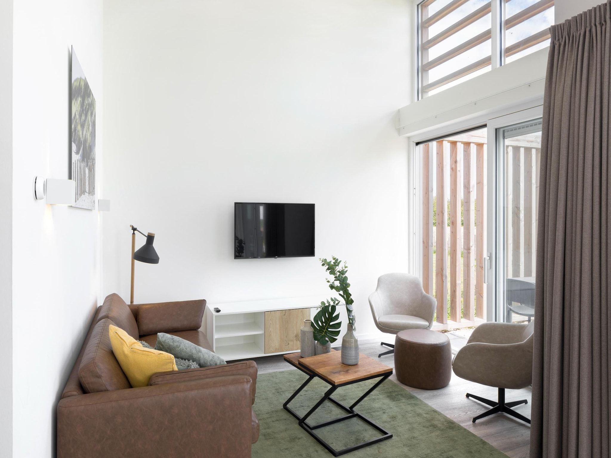 De woonkamer van Water Village 3 in Kamperland