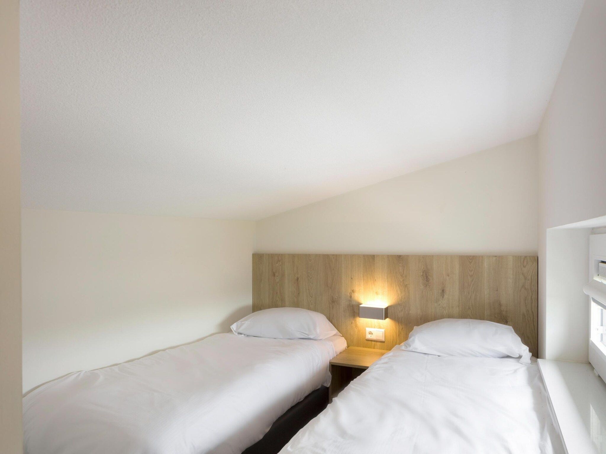 Een slaapkamer van Water Village 3 in Kamperland