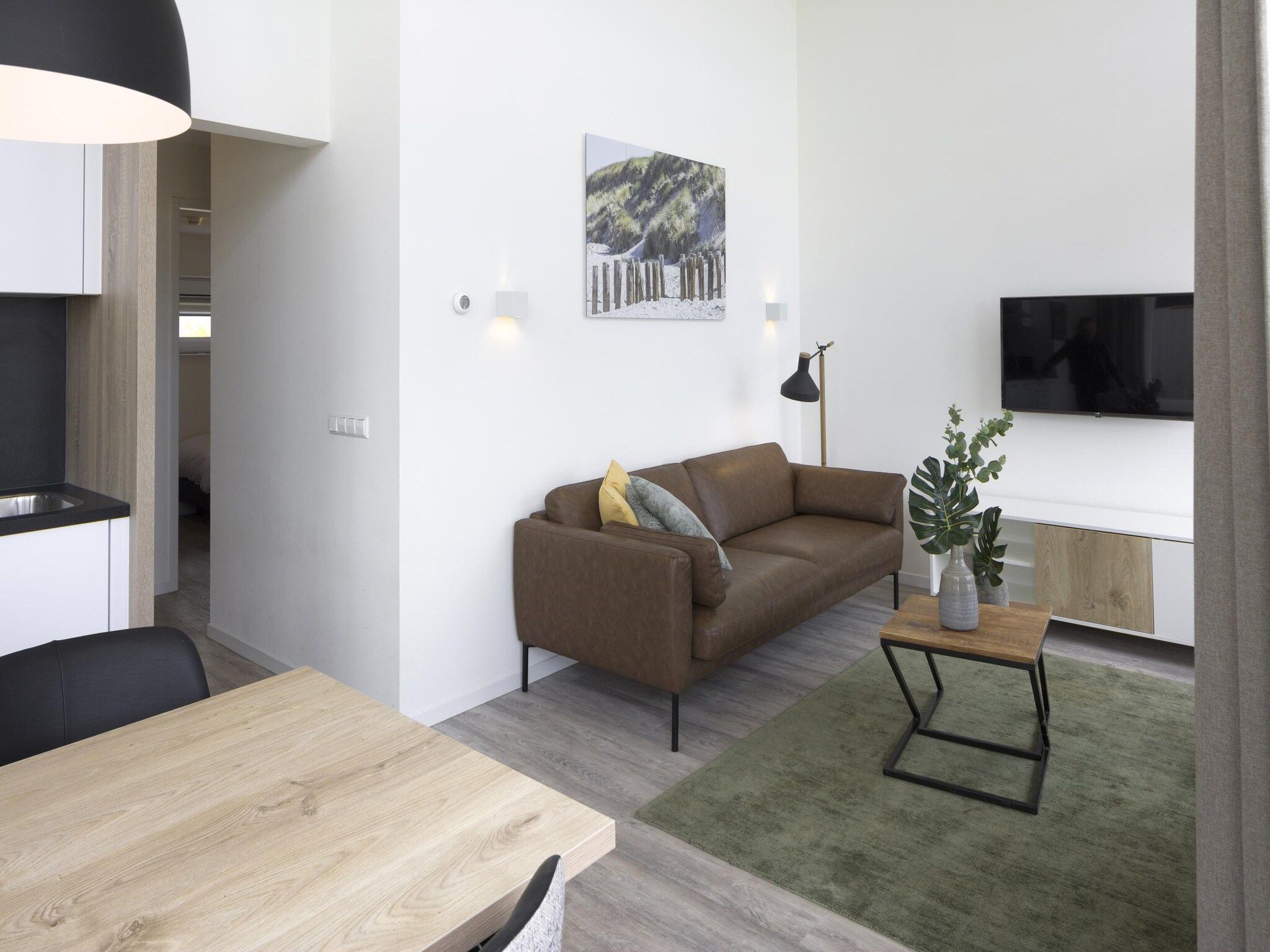 De woonkamer van Water Village 3 in Kamperland