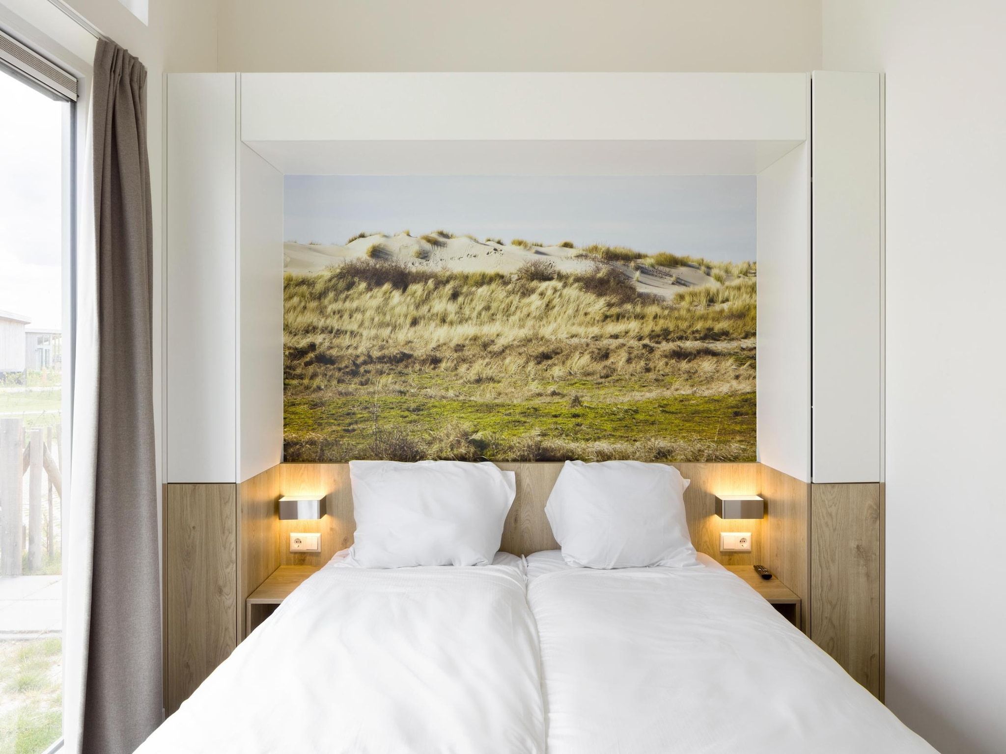 Een slaapkamer van Water Village 3 in Kamperland