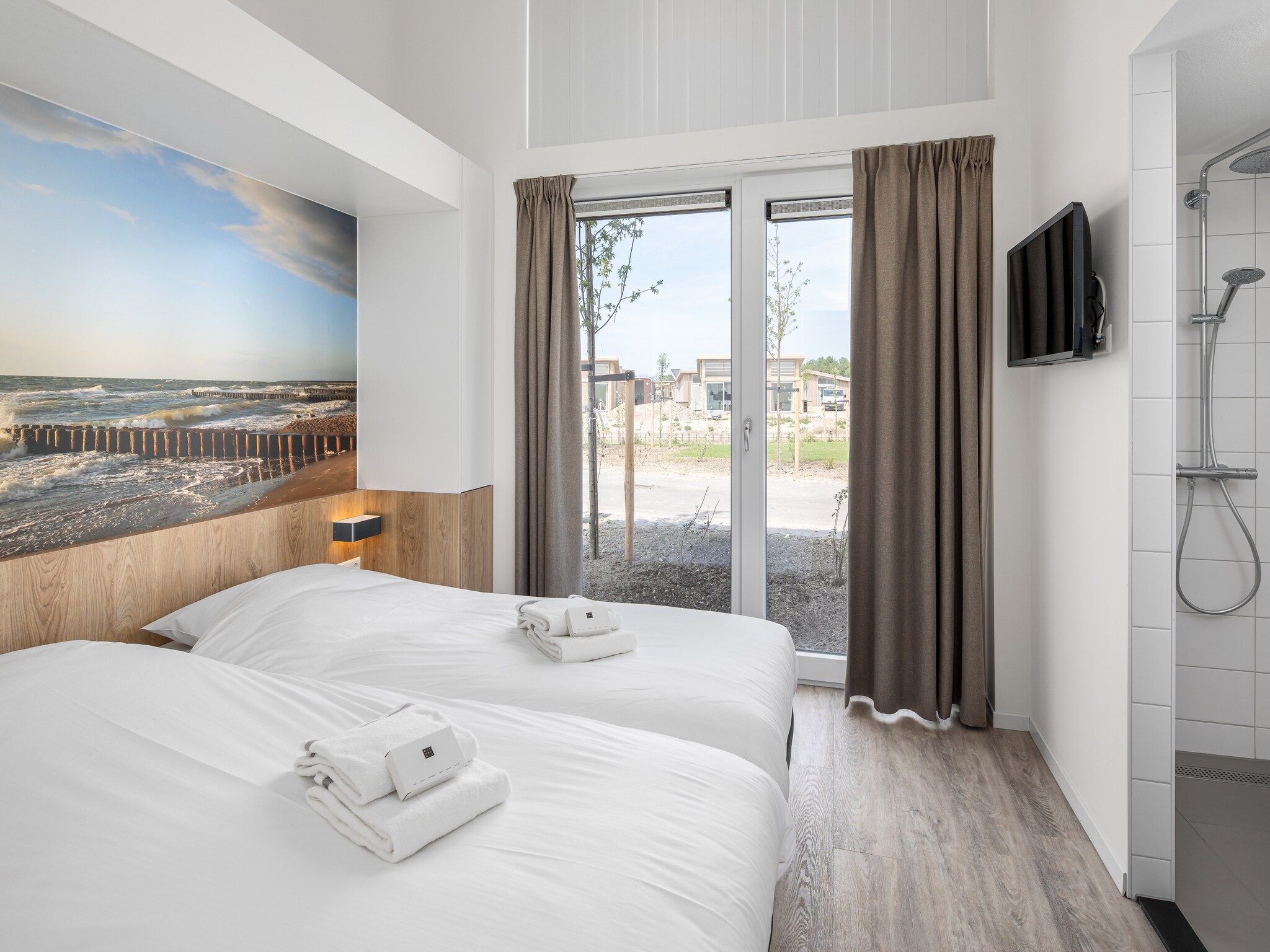 Een slaapkamer van Water Village 4 in Kamperland