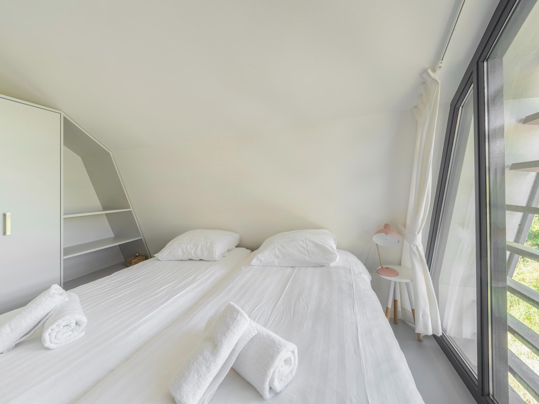 Een slaapkamer van Duinvilla aan het Meer in Egmond aan den Hoef