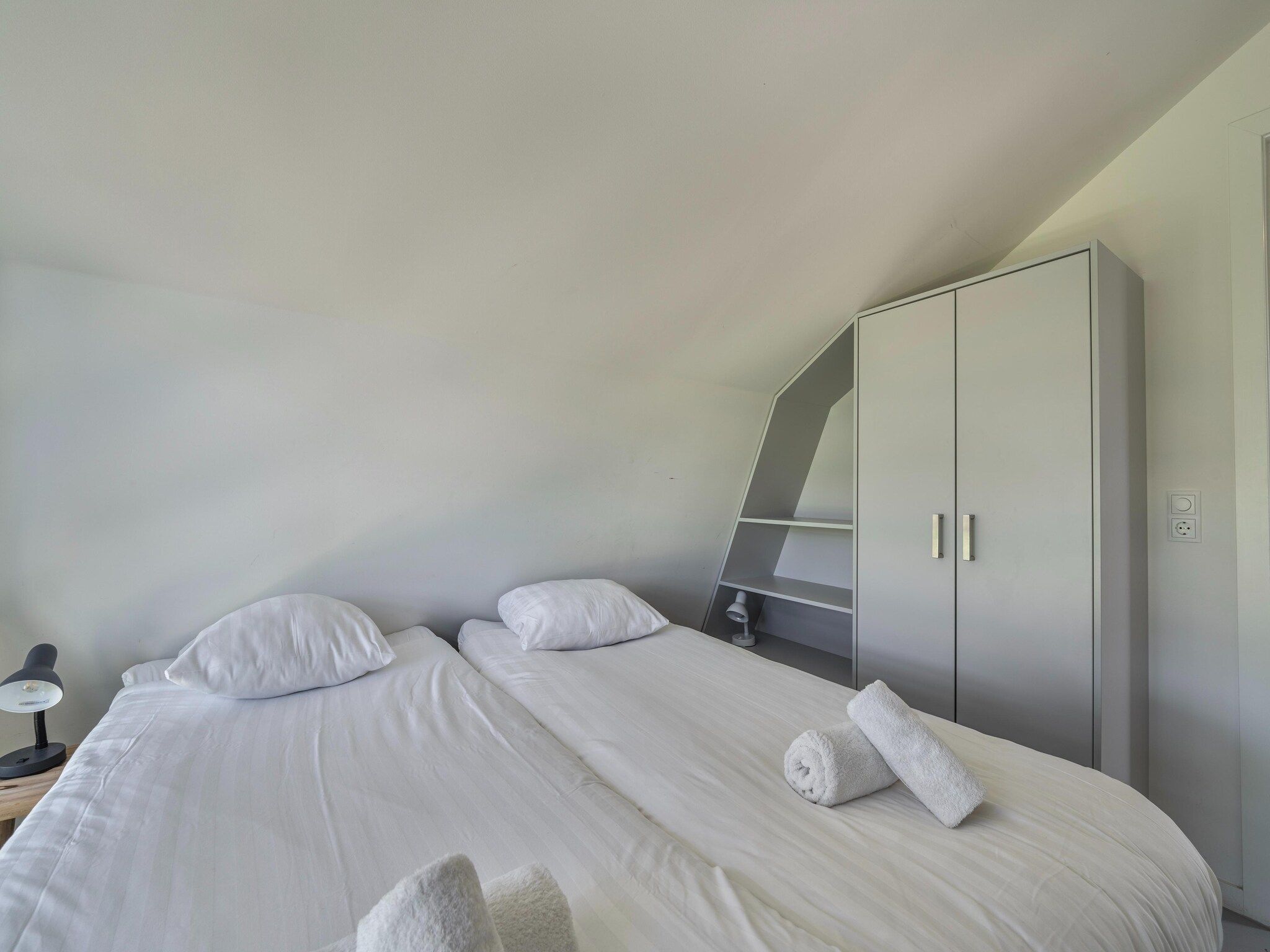 Een slaapkamer van Duinvilla aan het Meer in Egmond aan den Hoef