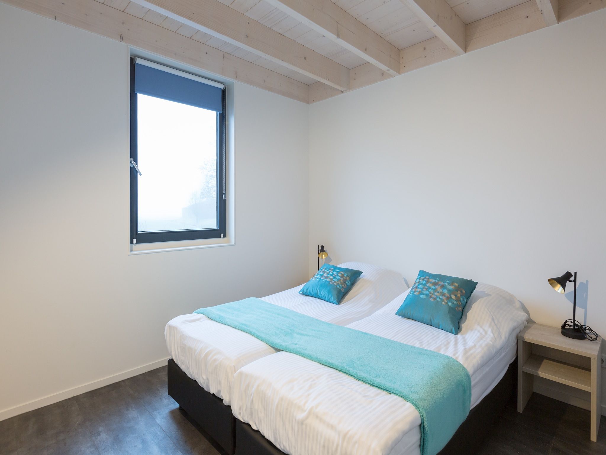 Een slaapkamer van Waterpark Langelille 1 in Langelille