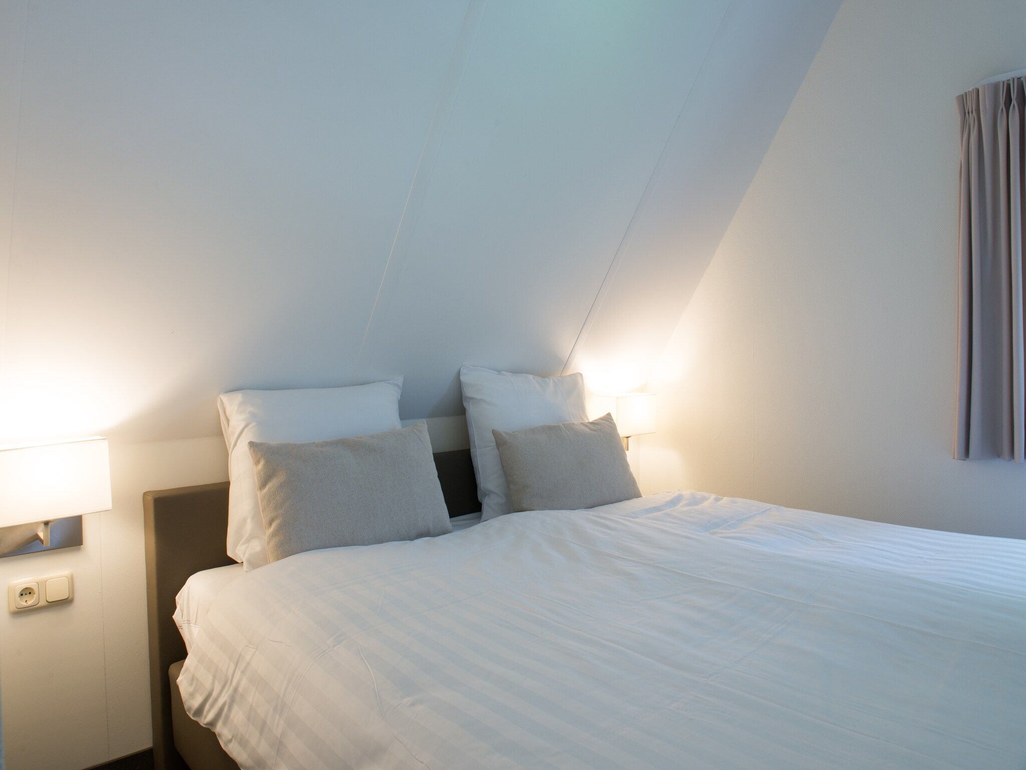 Een slaapkamer van Hof van Salland 10 in Hellendoorn