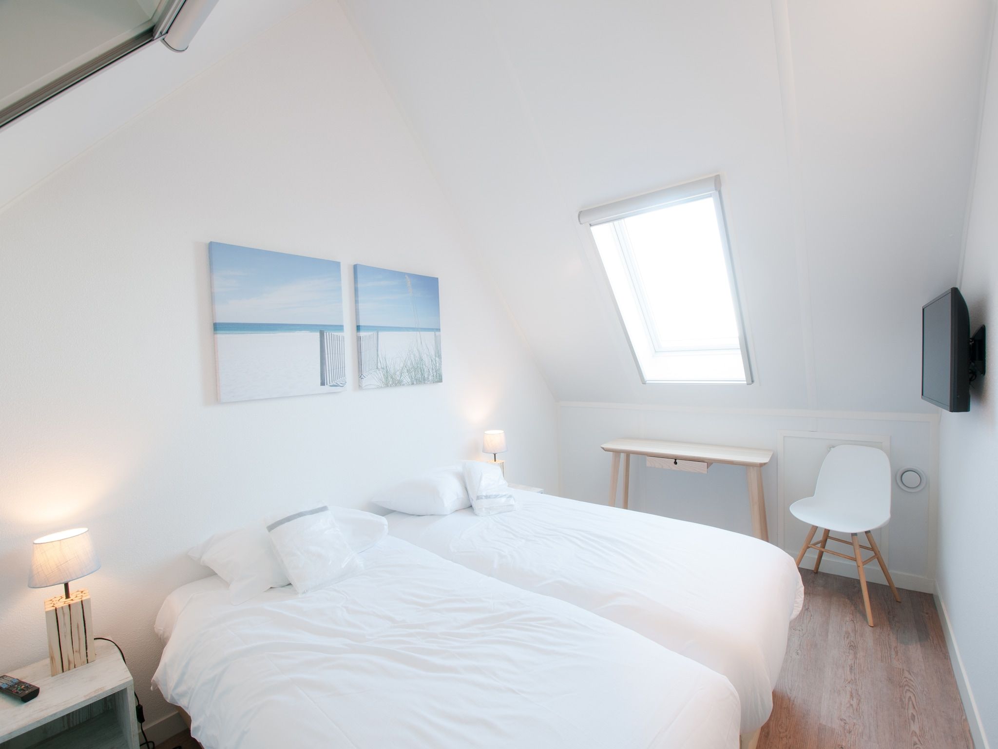 Een slaapkamer van Resort Waterrijk Oesterdam 2 in Tholen