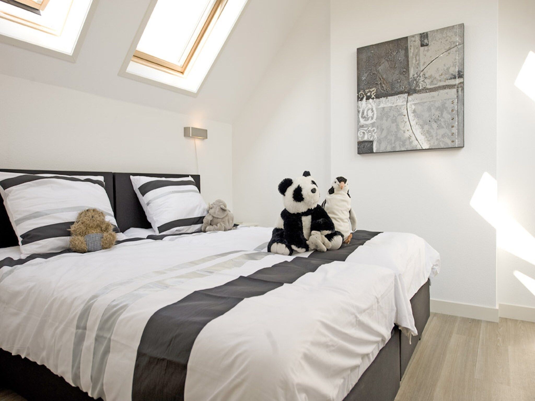 Een slaapkamer van Resort Waterrijk Oesterdam 3 in Tholen