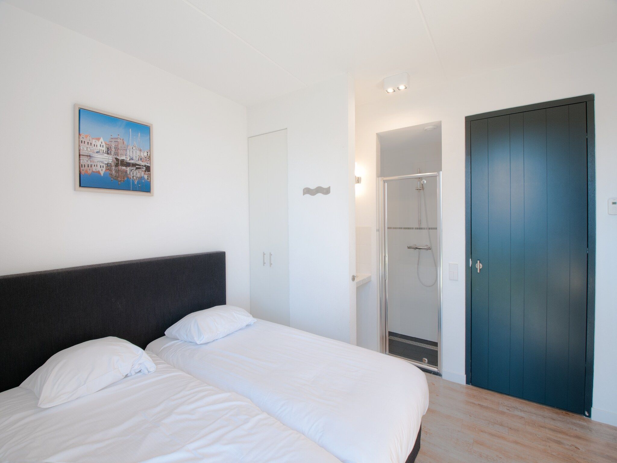 Een slaapkamer van Resort Waterrijk Oesterdam 5 in Tholen