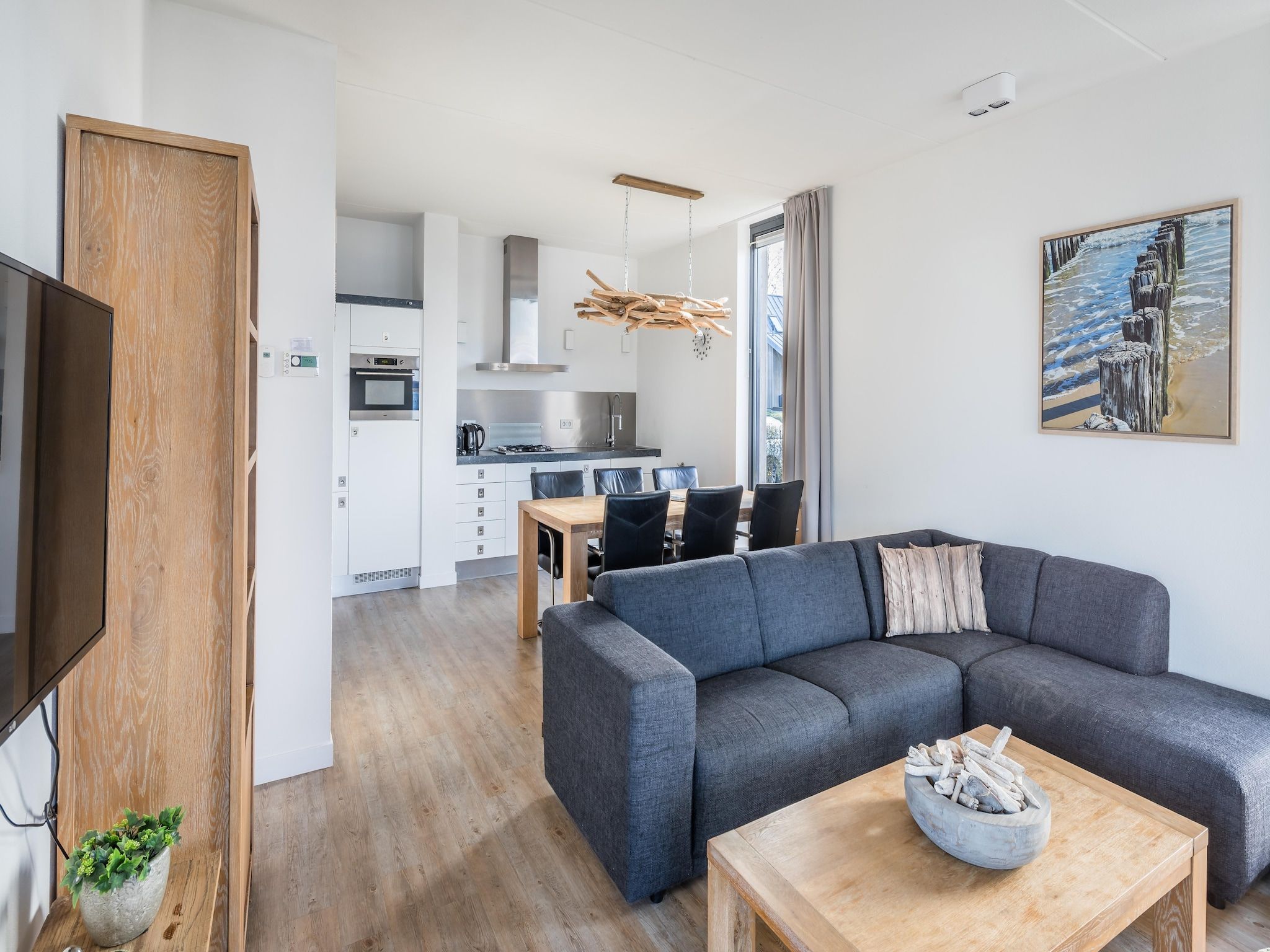 De woonkamer van Resort Waterrijk Oesterdam 5 in Tholen